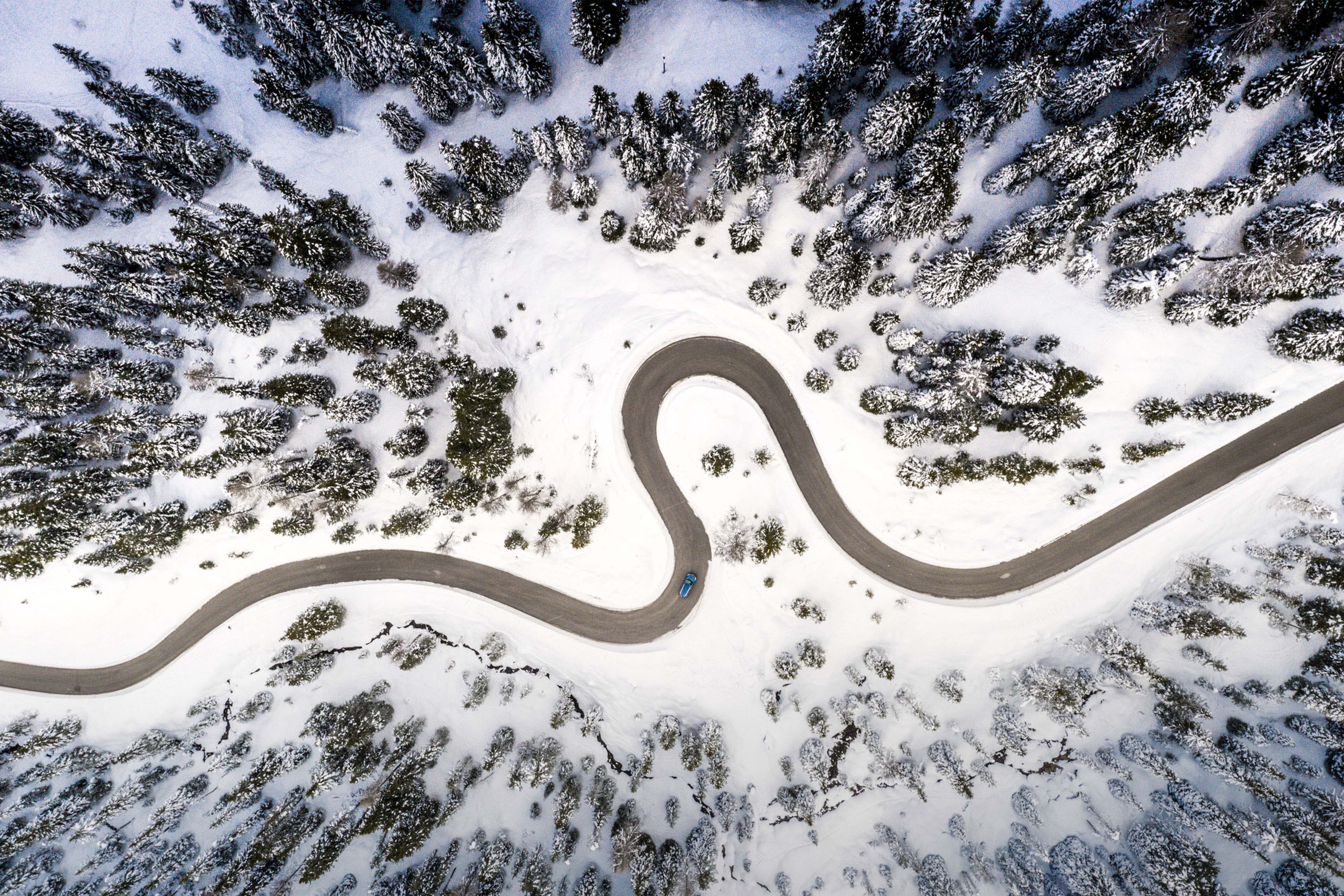 Hairpin bends of snowy mountain road