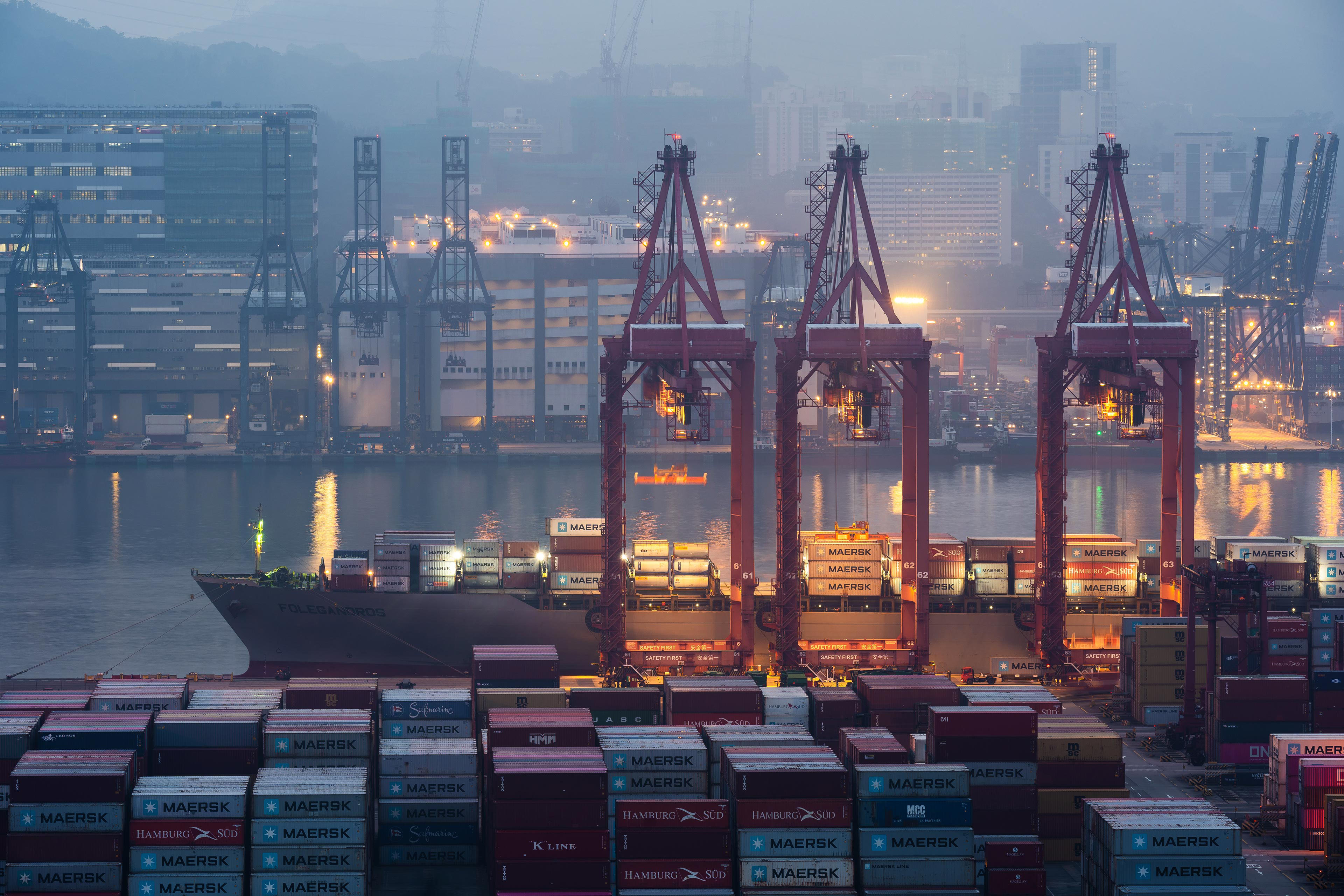 Cranes loading containers at a port