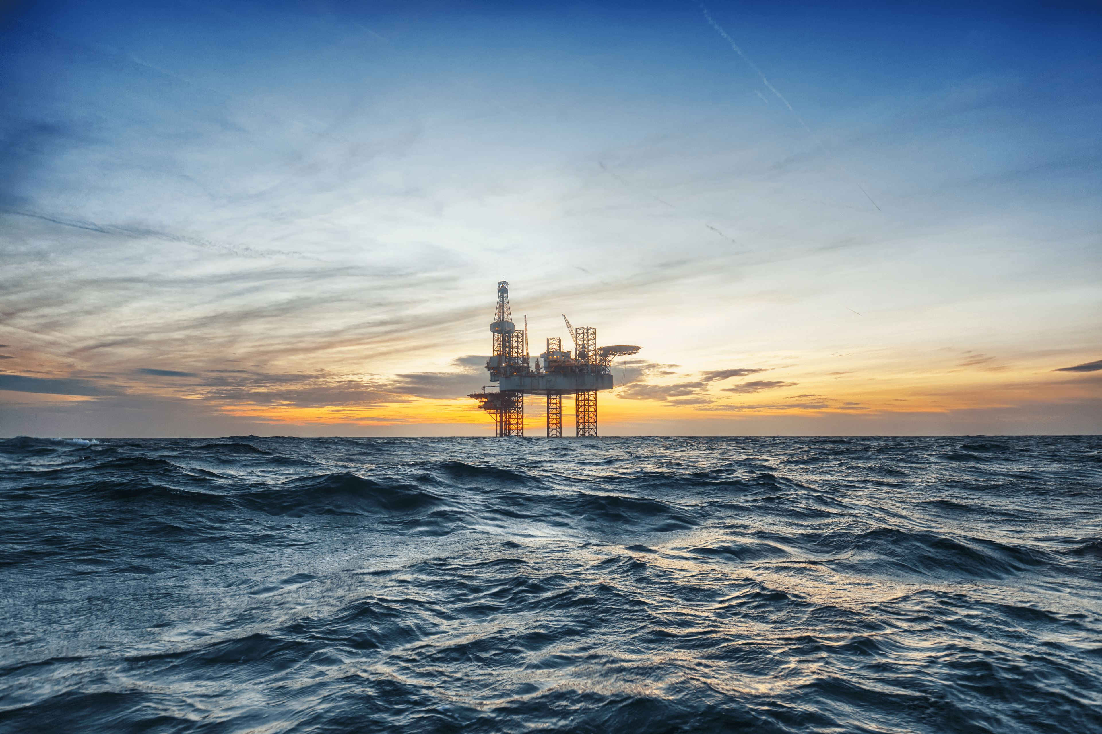 offshore drilling rig at sunset