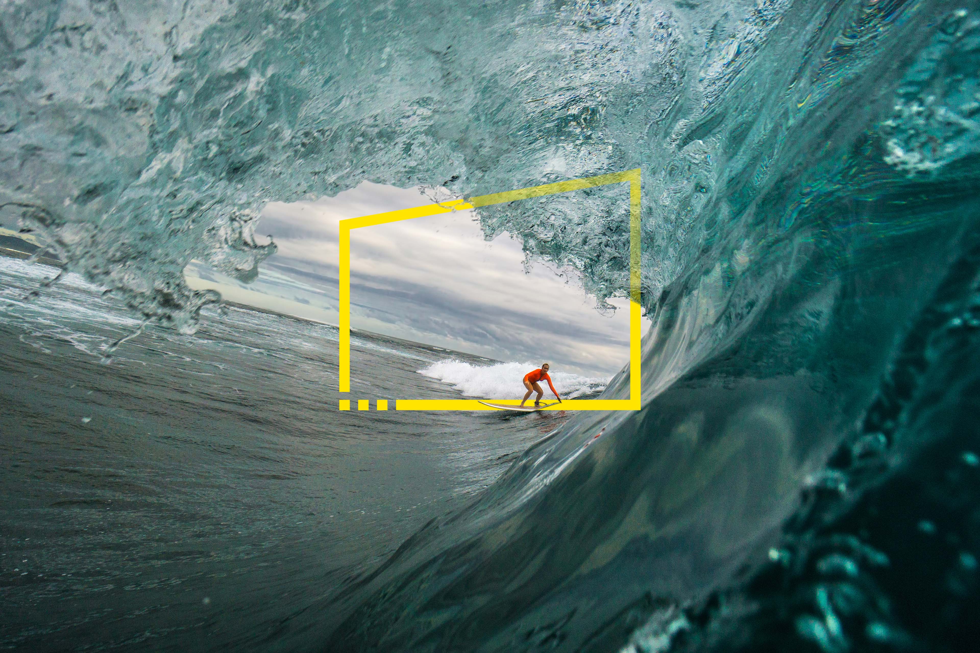 surfer keeping ahead of big wave