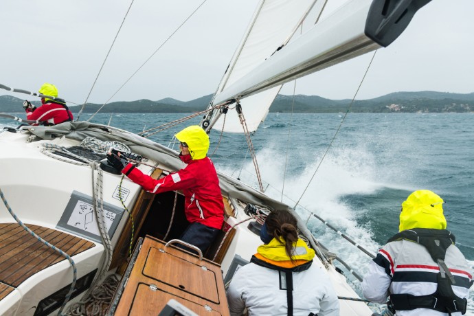 Sailing course crew on rippled sea