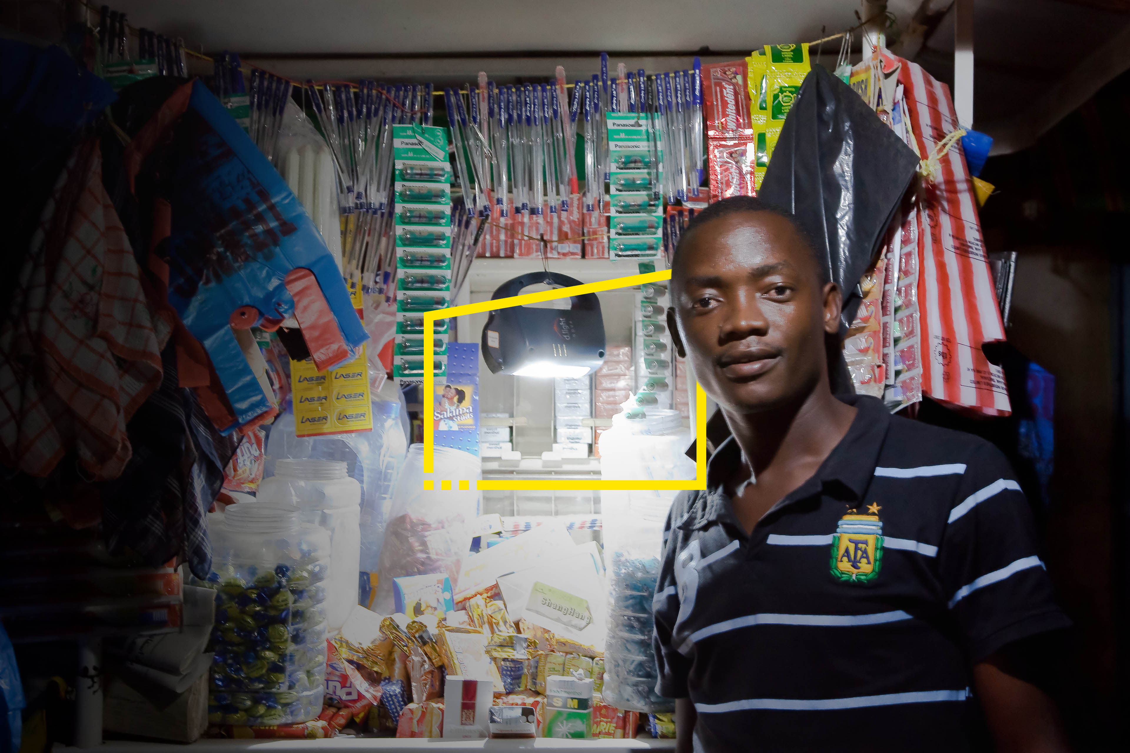 Man standing in front of local shop