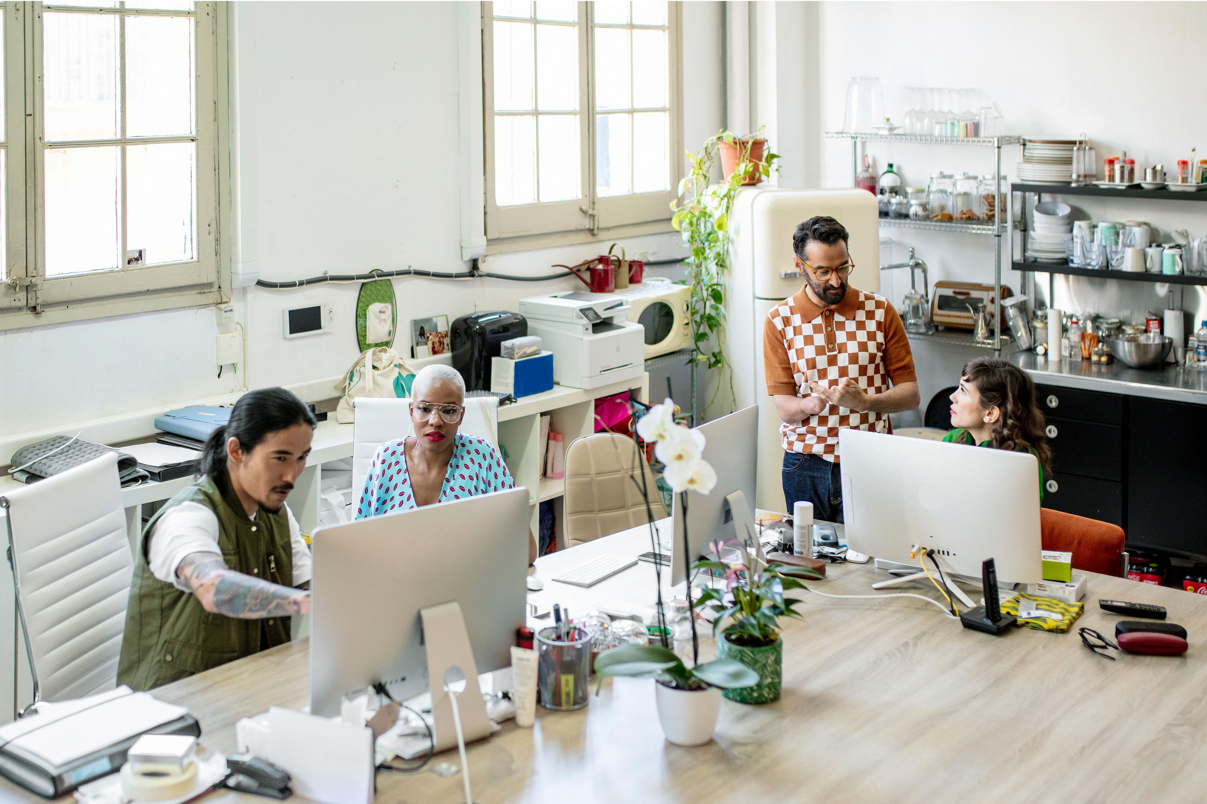  Creative executives working computers desk