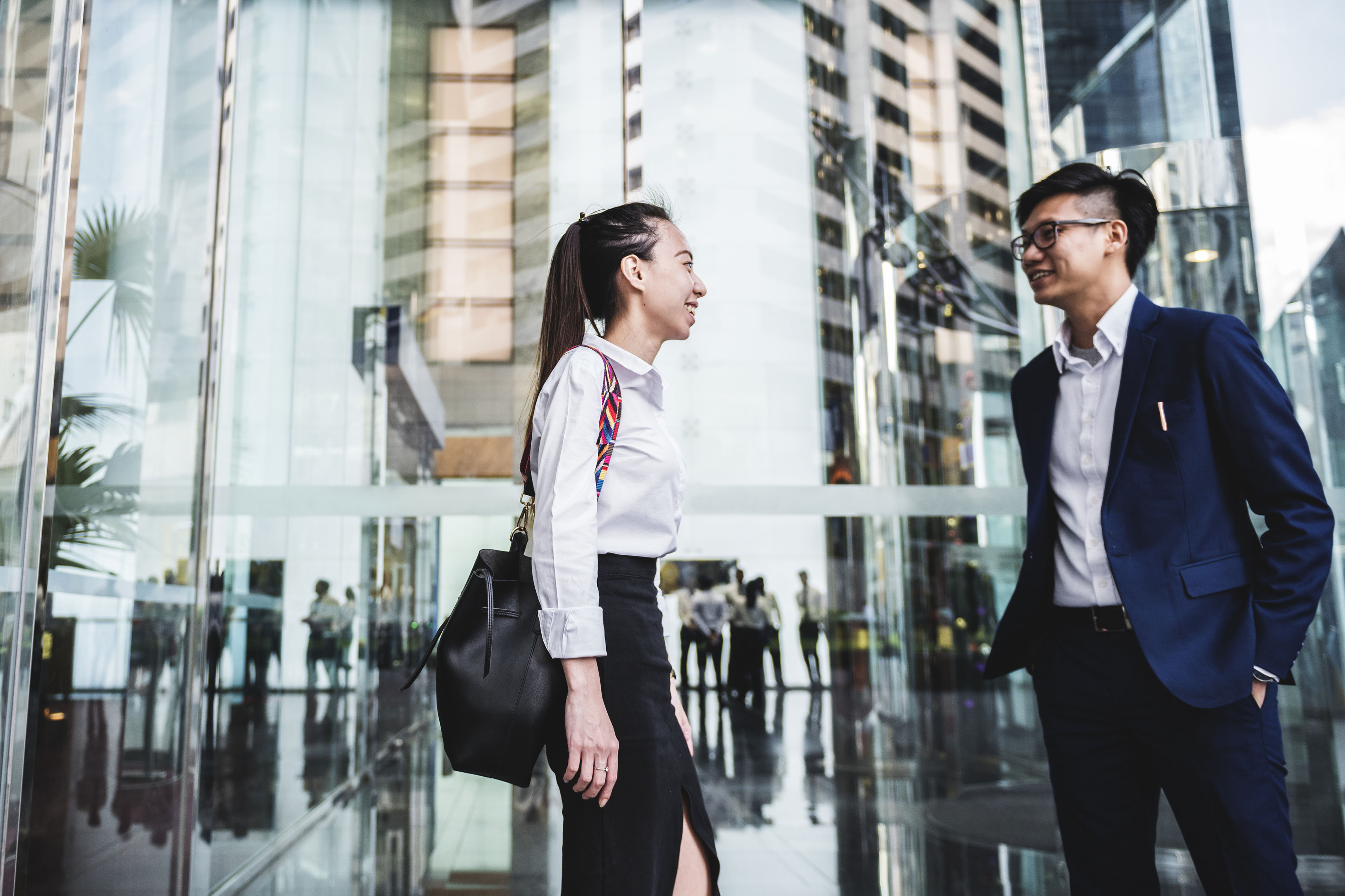 Asian business people in a city