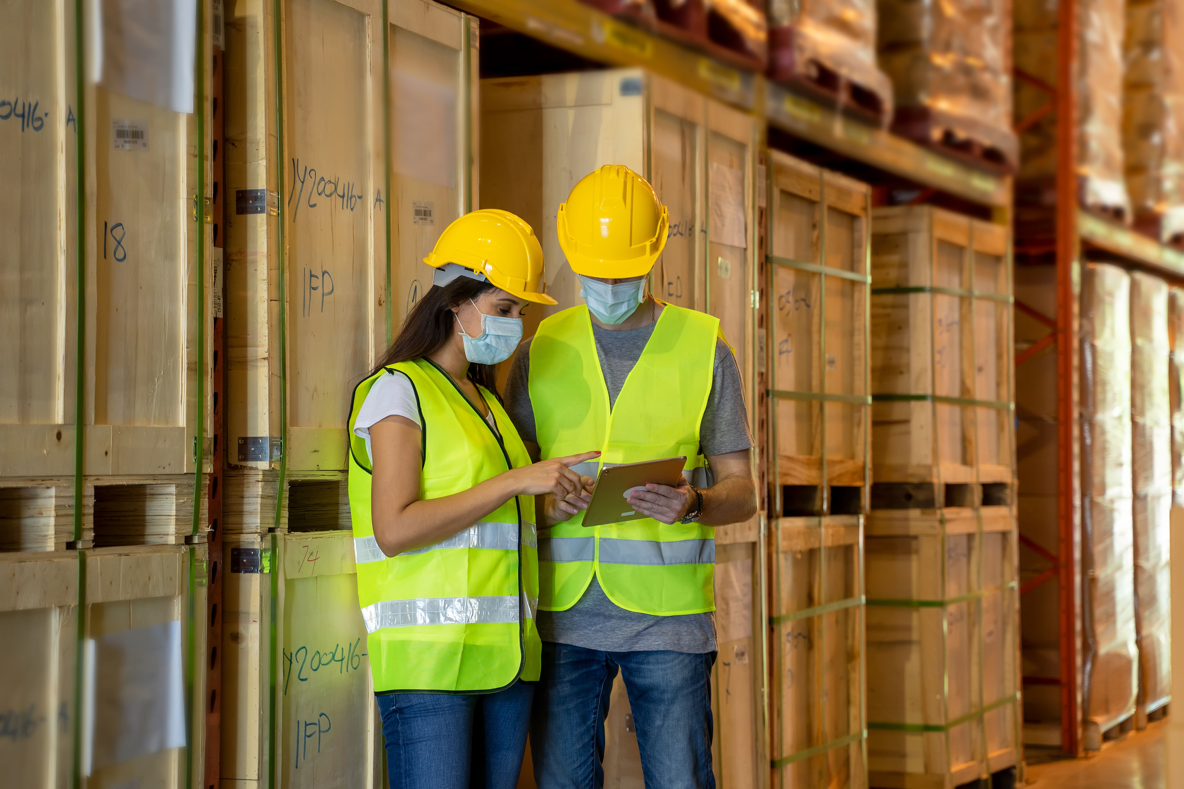 Warehouse worker checking production process