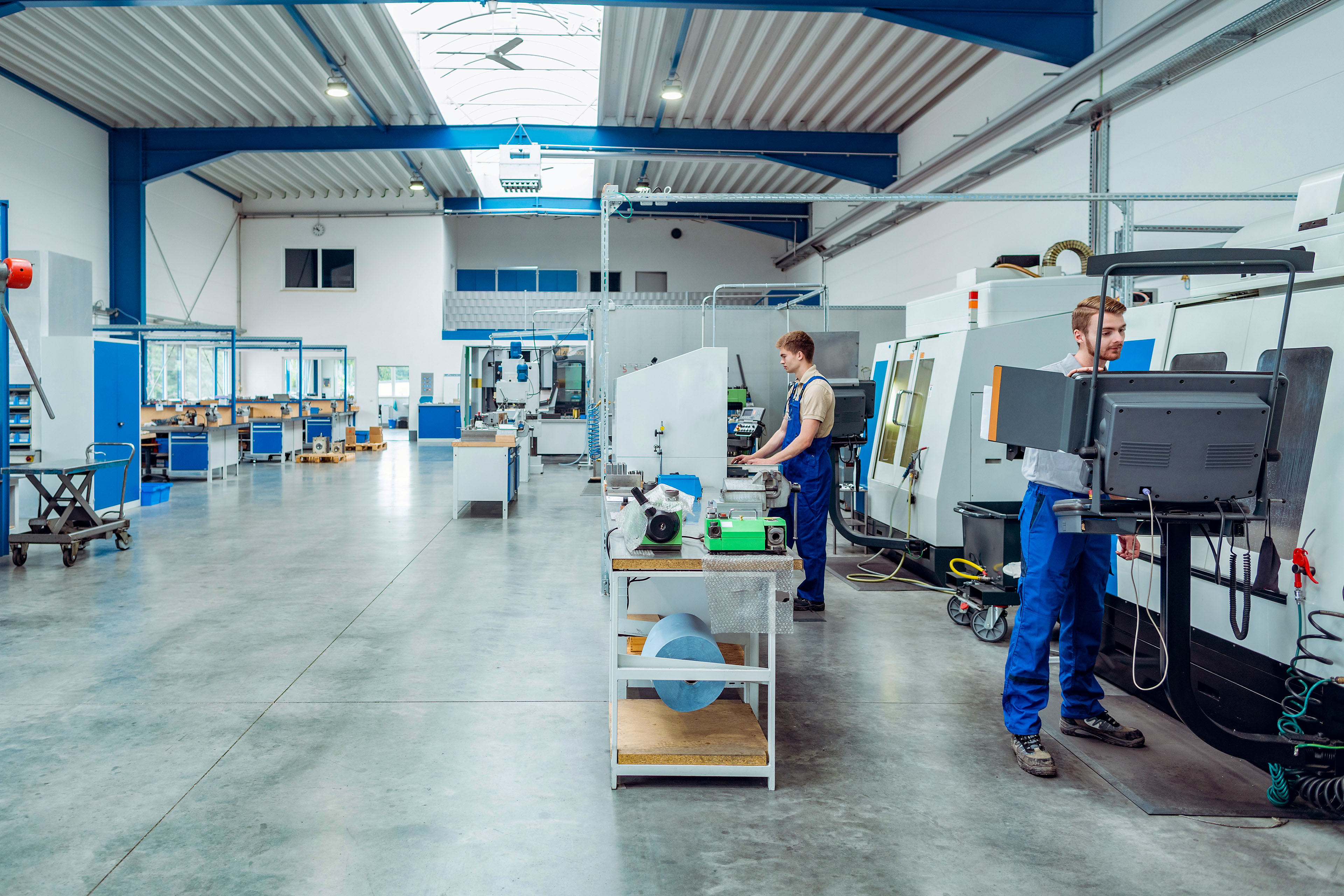 Workers working on the factory floor