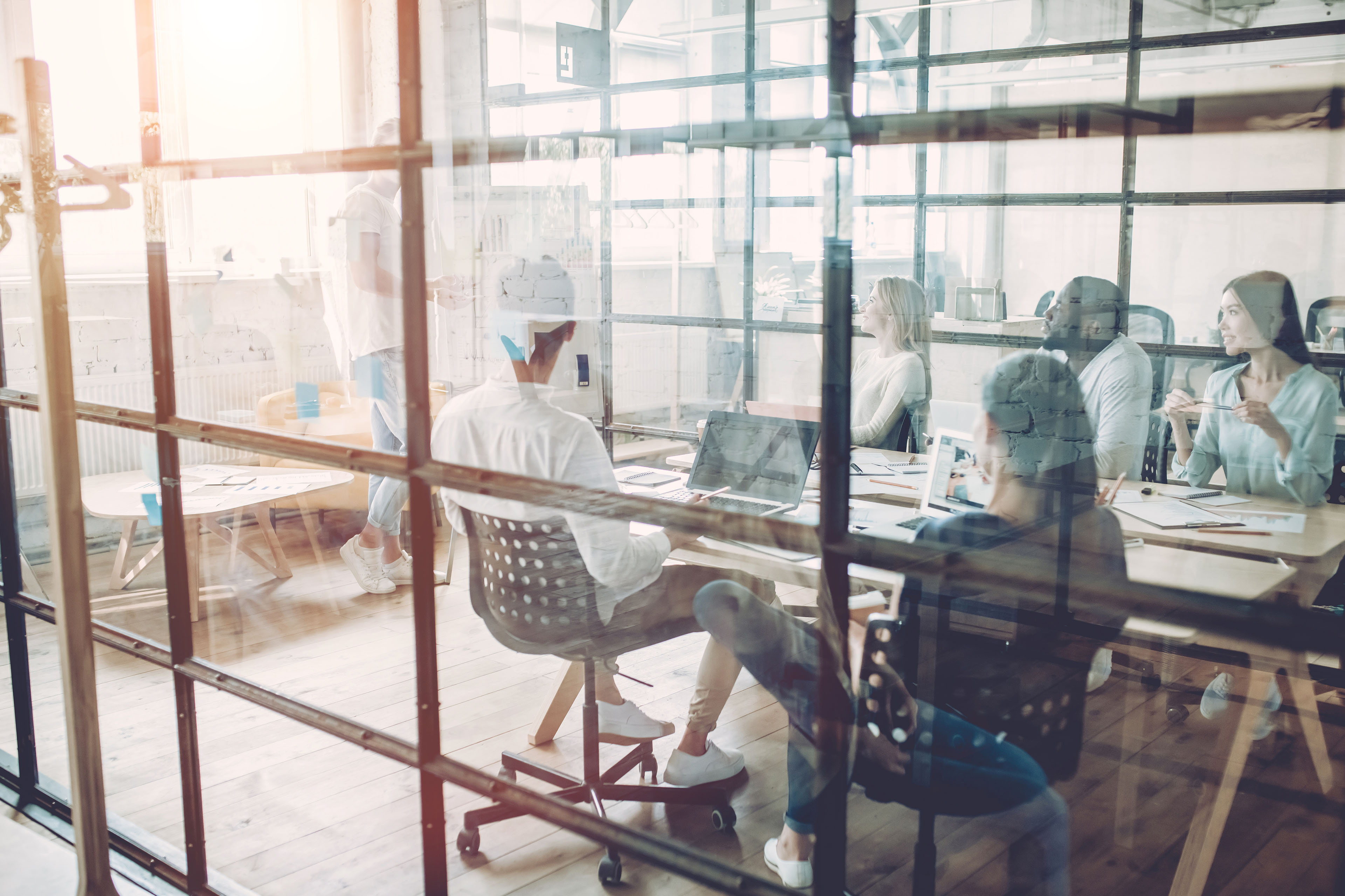 Young people work in modern office