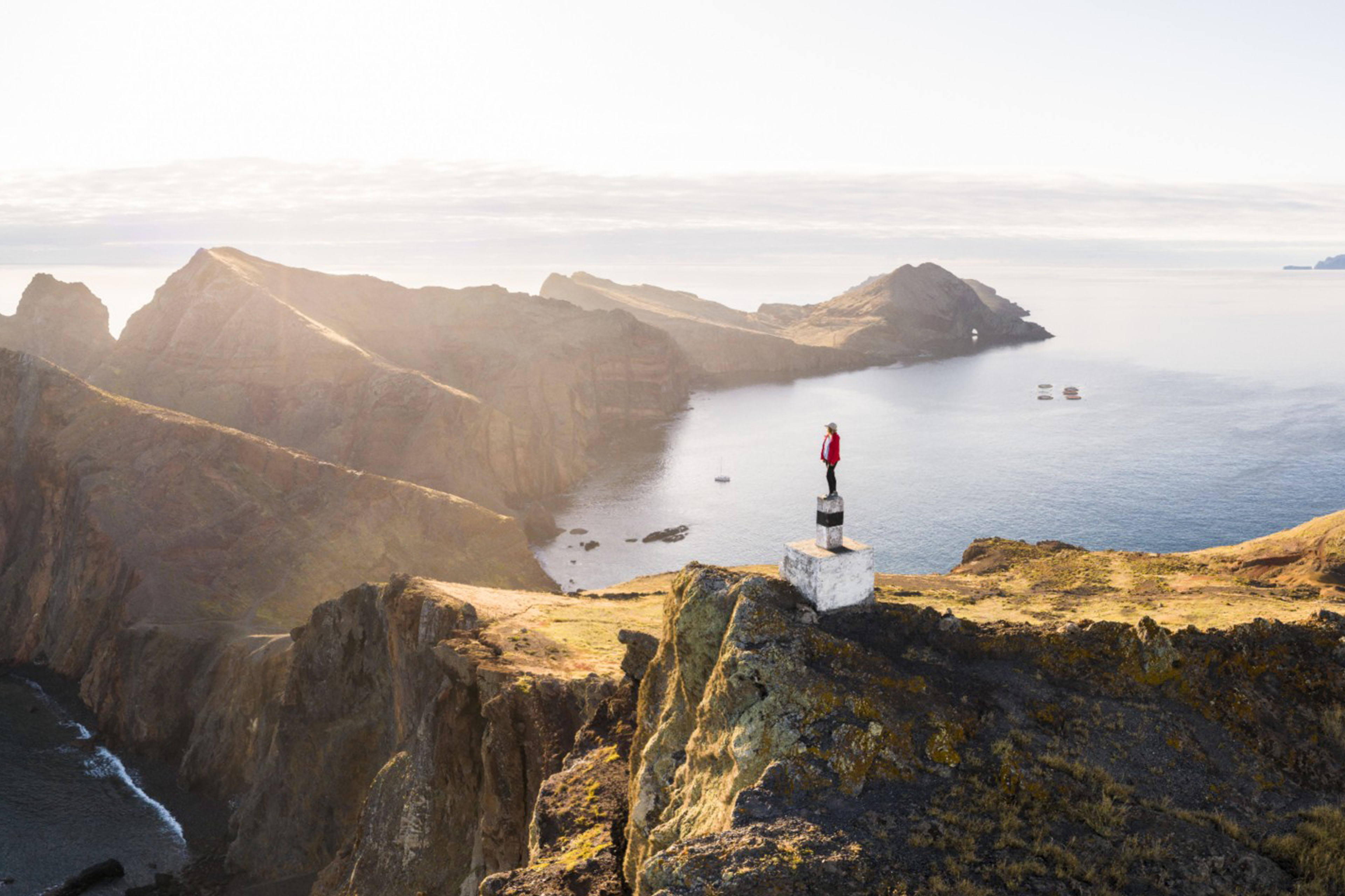 Man standing on mountain top