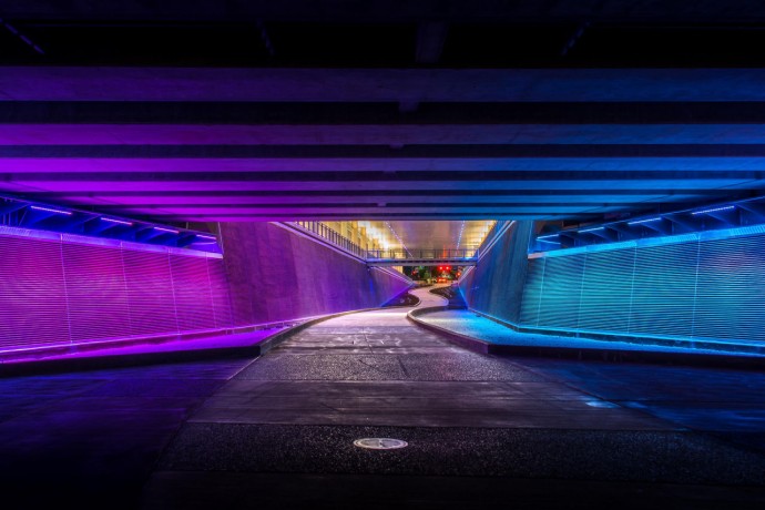 illuminated-pathway-under-the-bridge