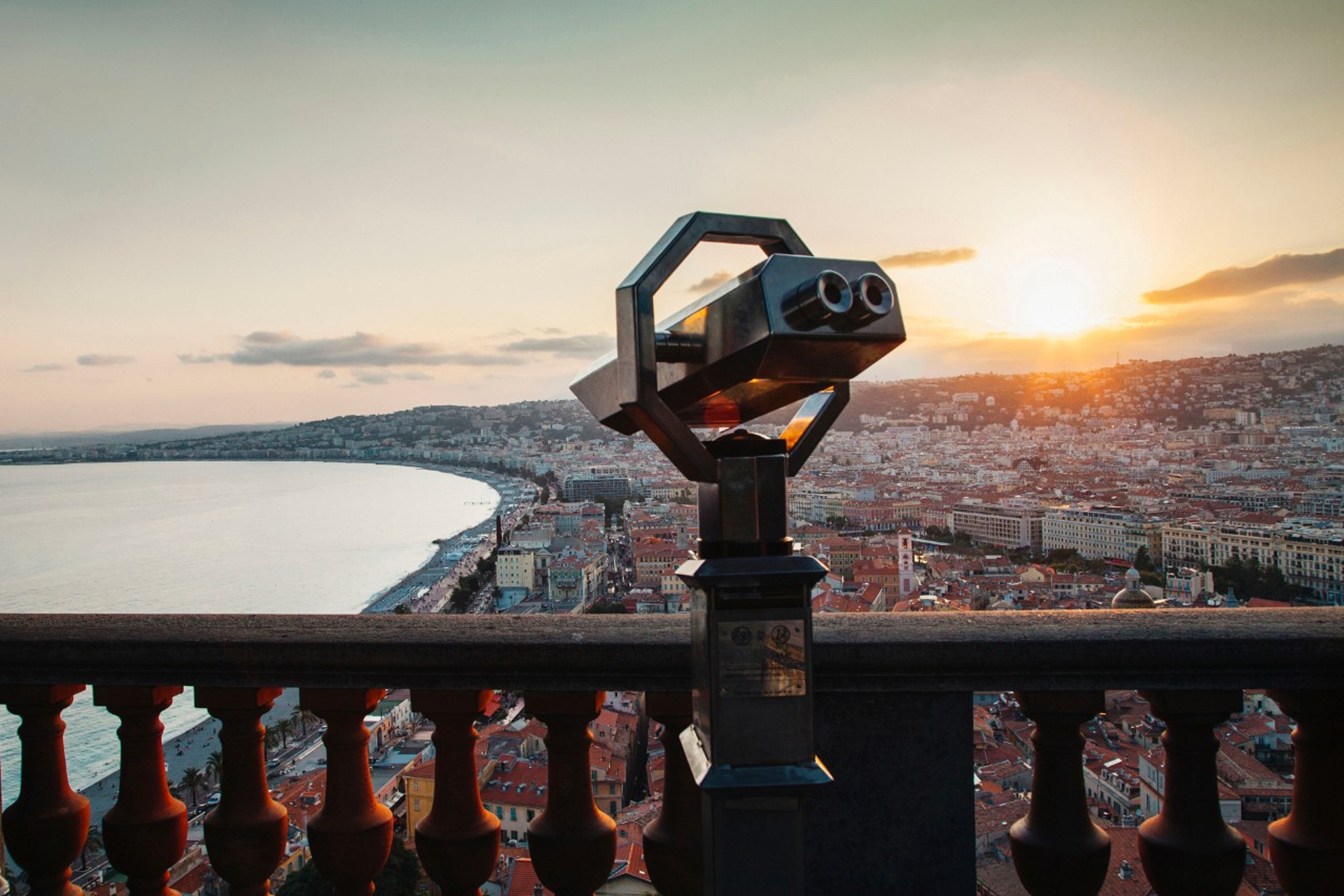 coin operated binoculars cityscape sky