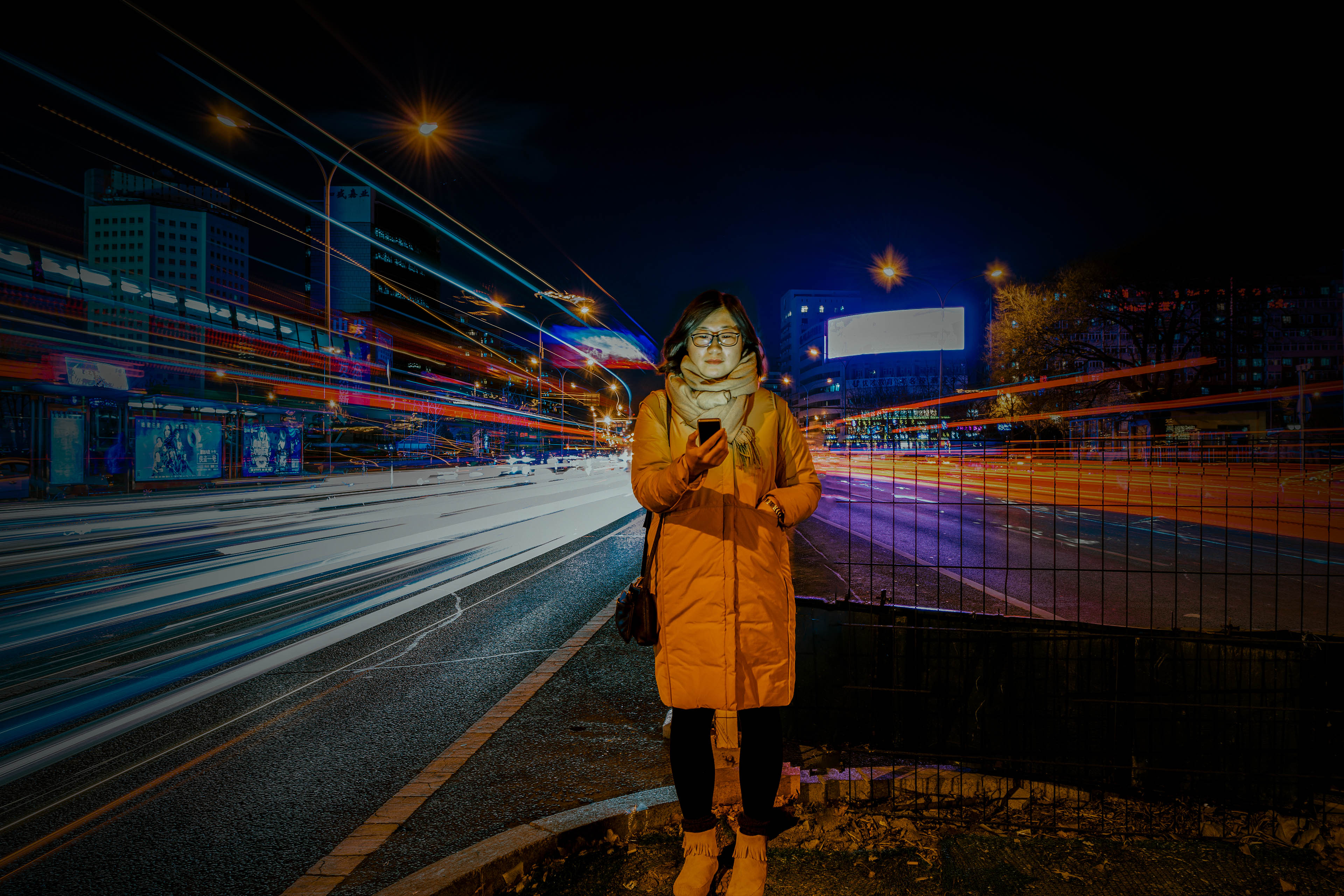 Woman using a mobile phone in downtown district