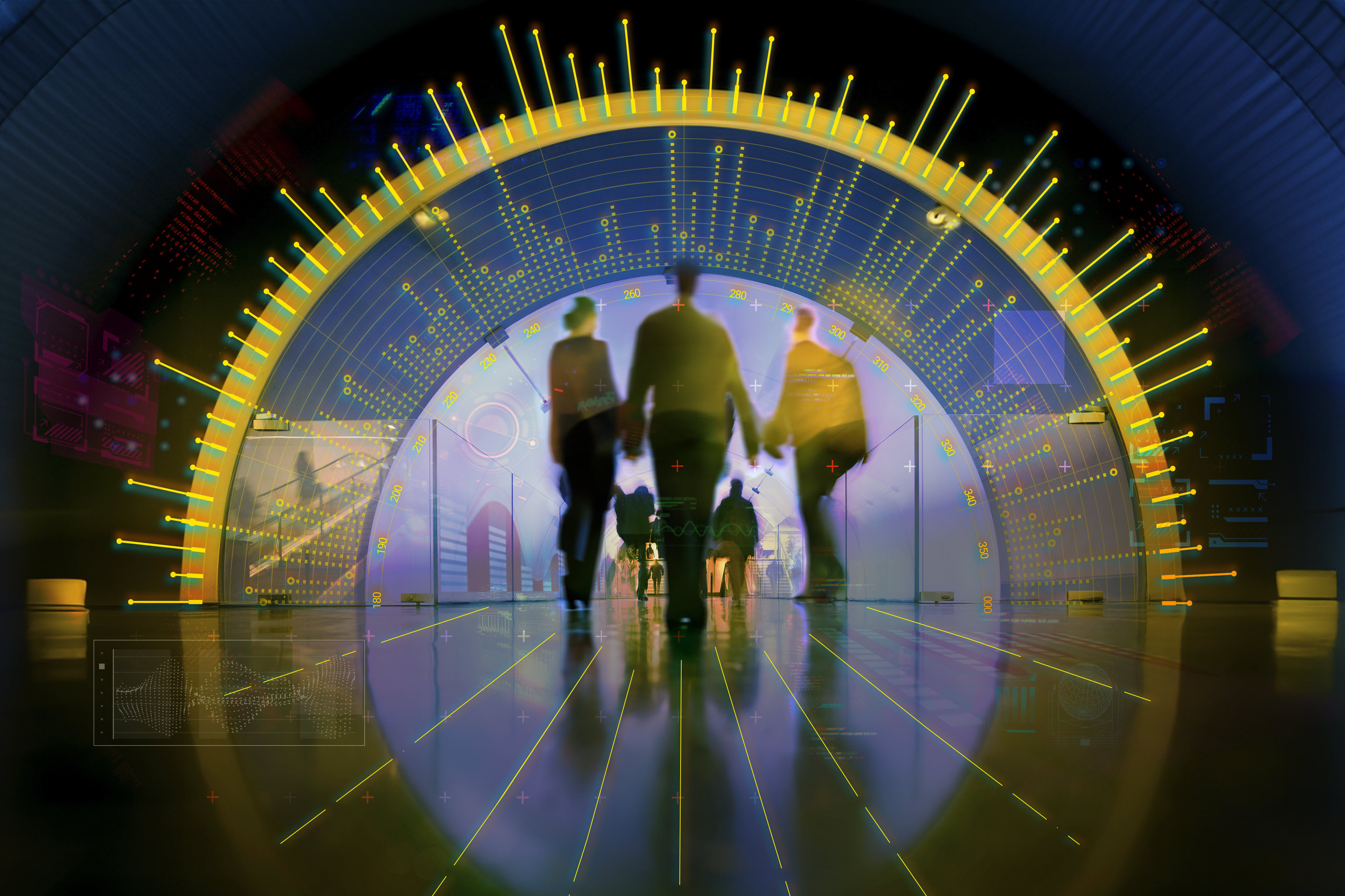 People passing LED illuminated tunnel