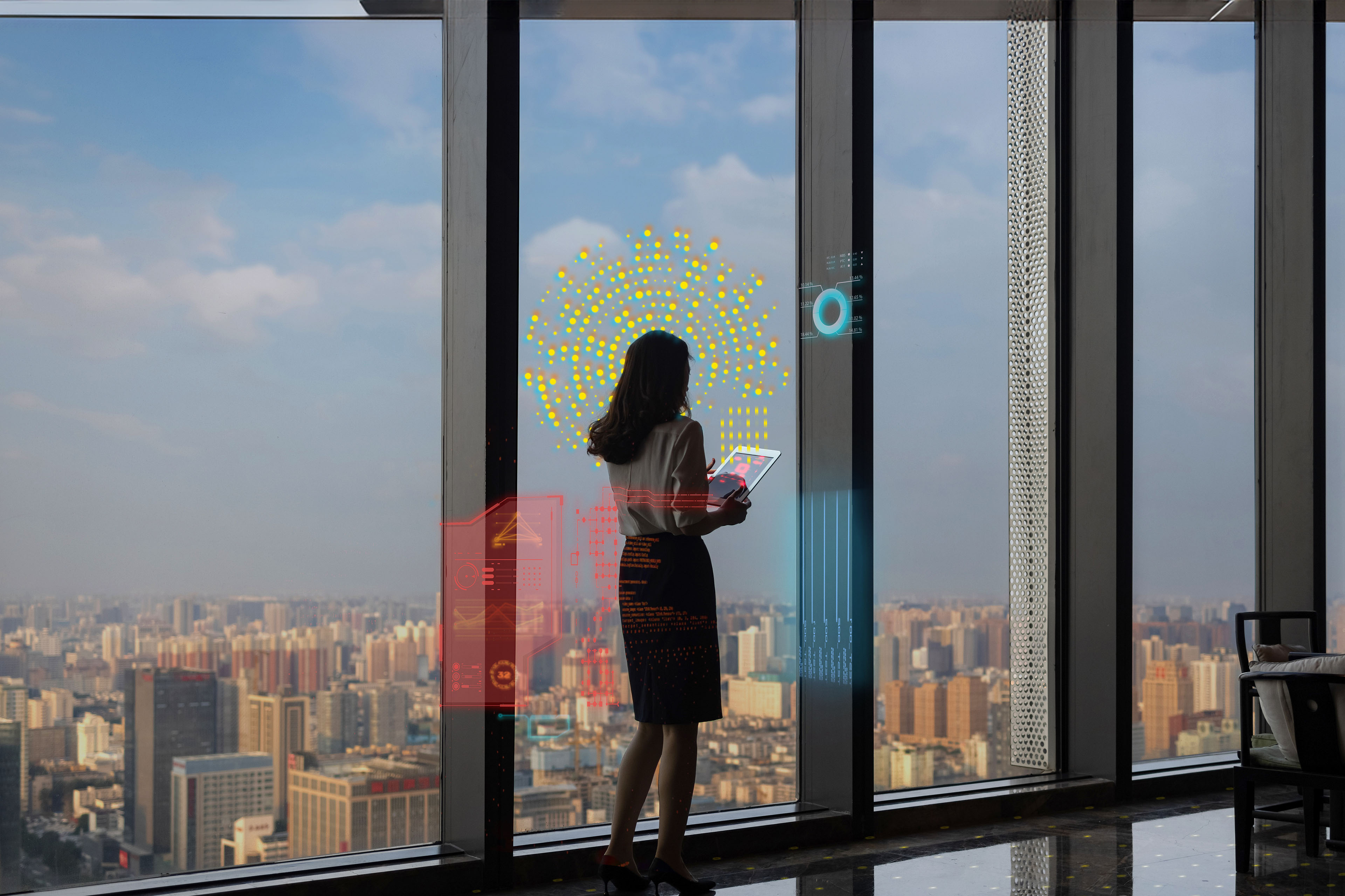 Business woman in front of glass windows