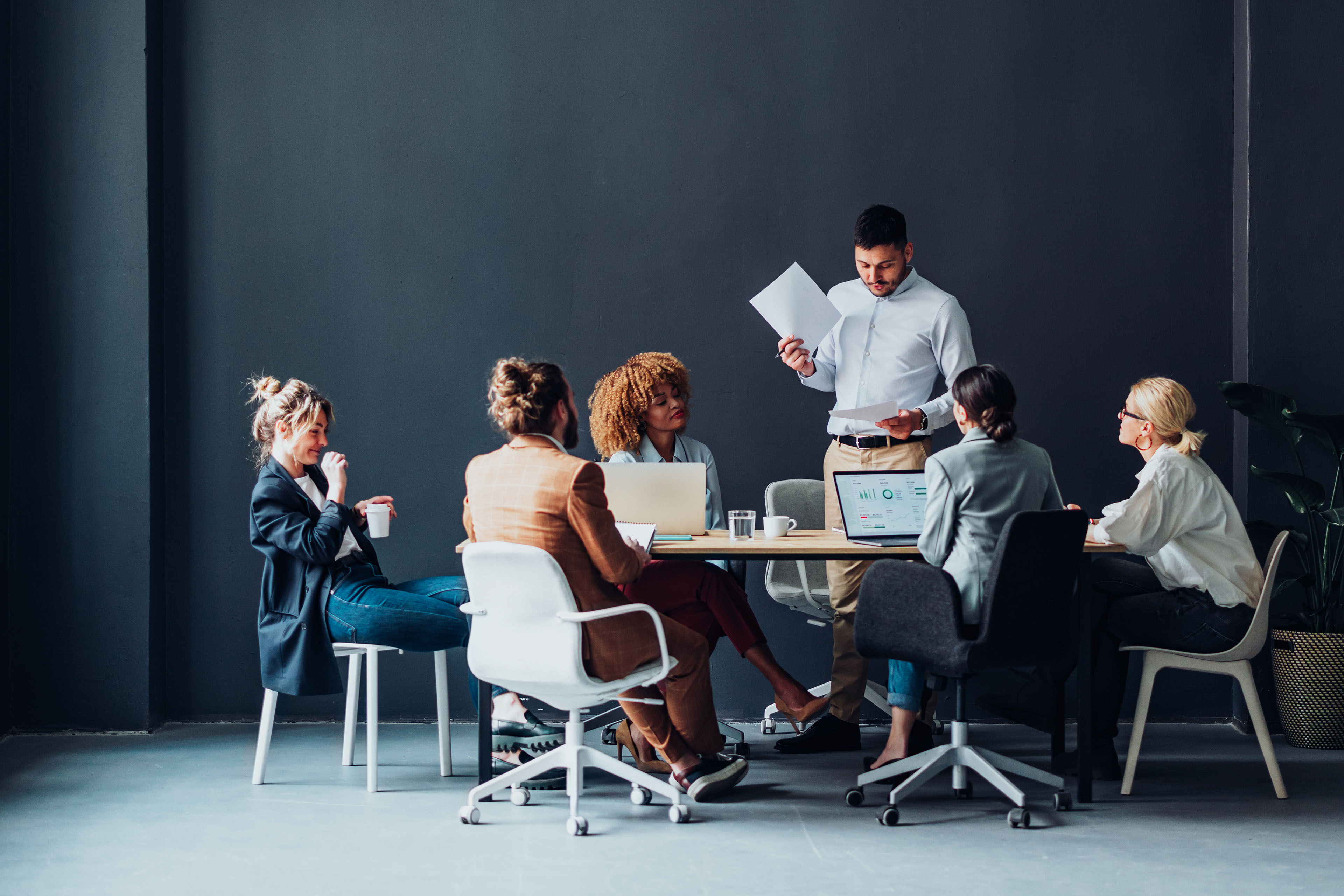 Group Of Businesspeople Having a Meeting At Their Company