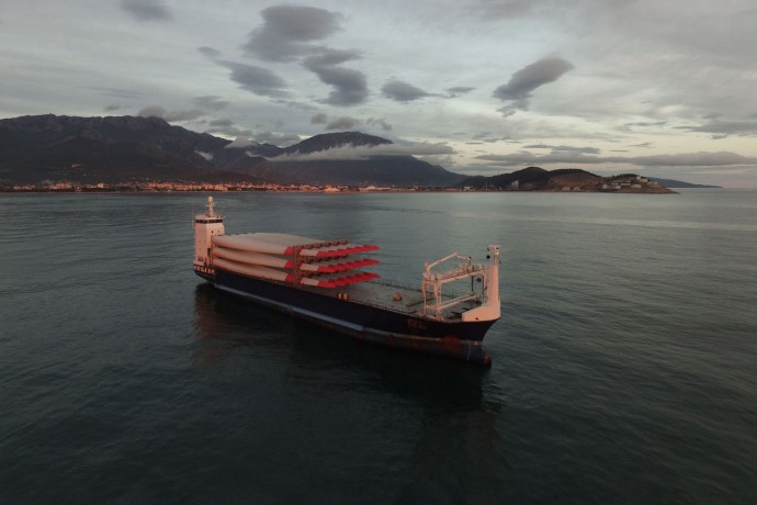 Aerial view of a cargo vessel loaded with rotor blades