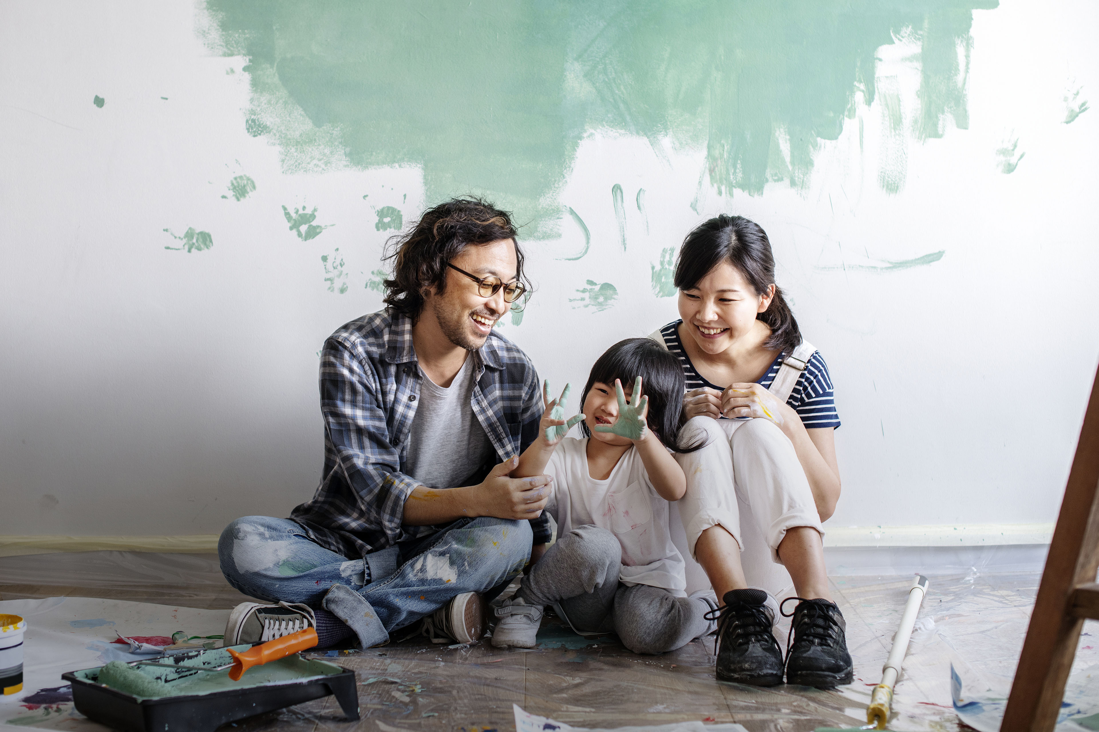 Asian family renovating the house