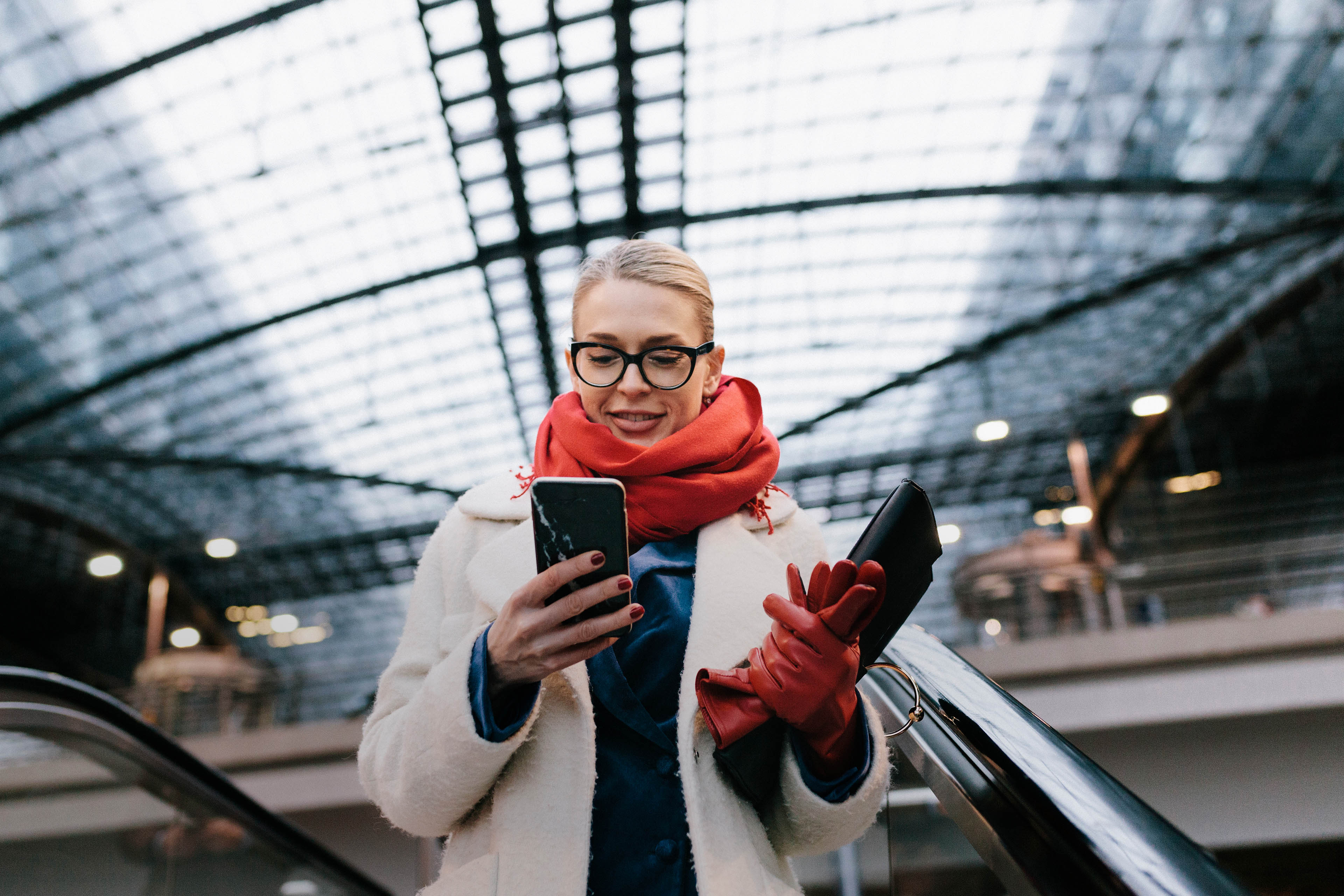 Businesswoman texting on way to the office