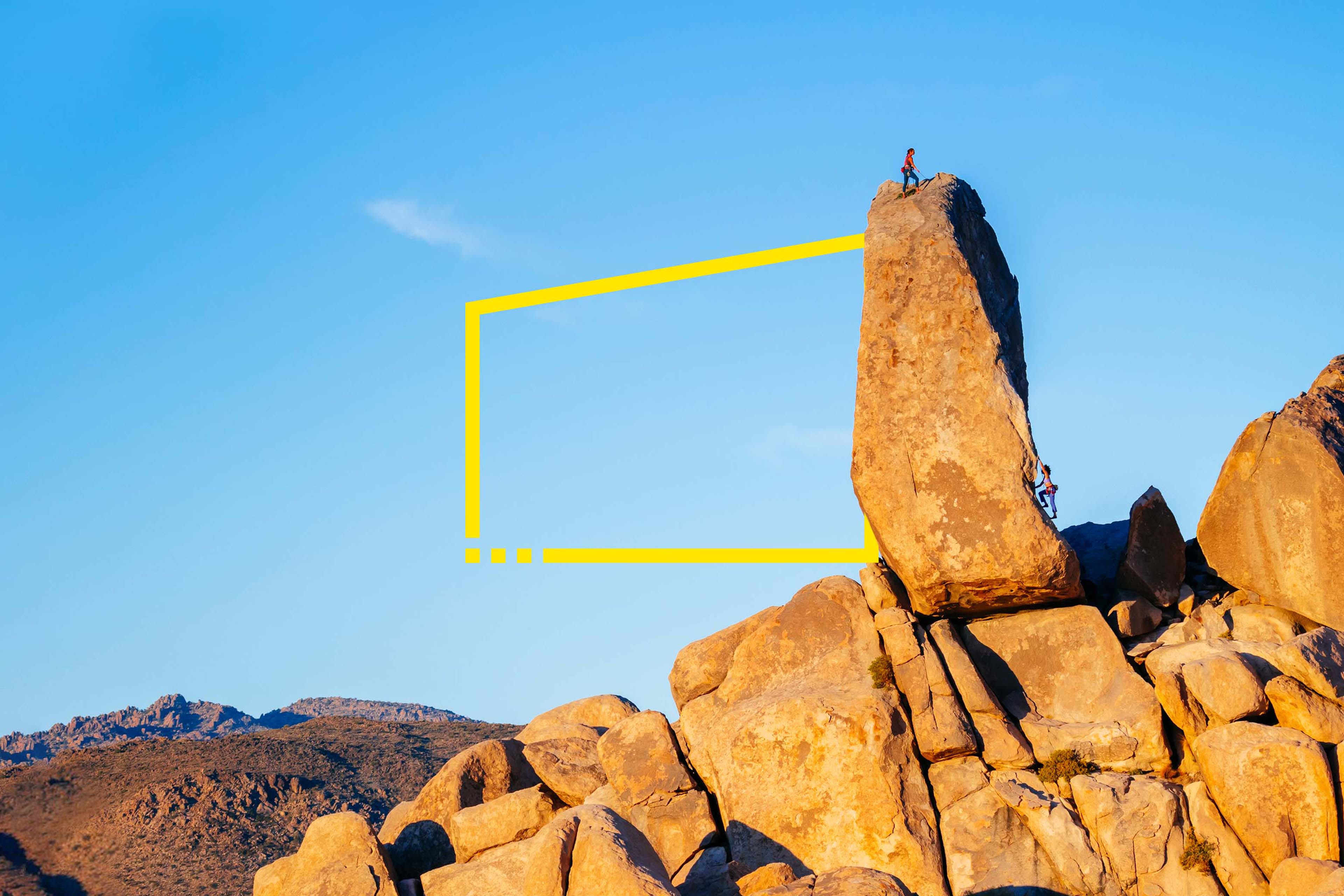 Two women climbing a stack in a National Park, USA