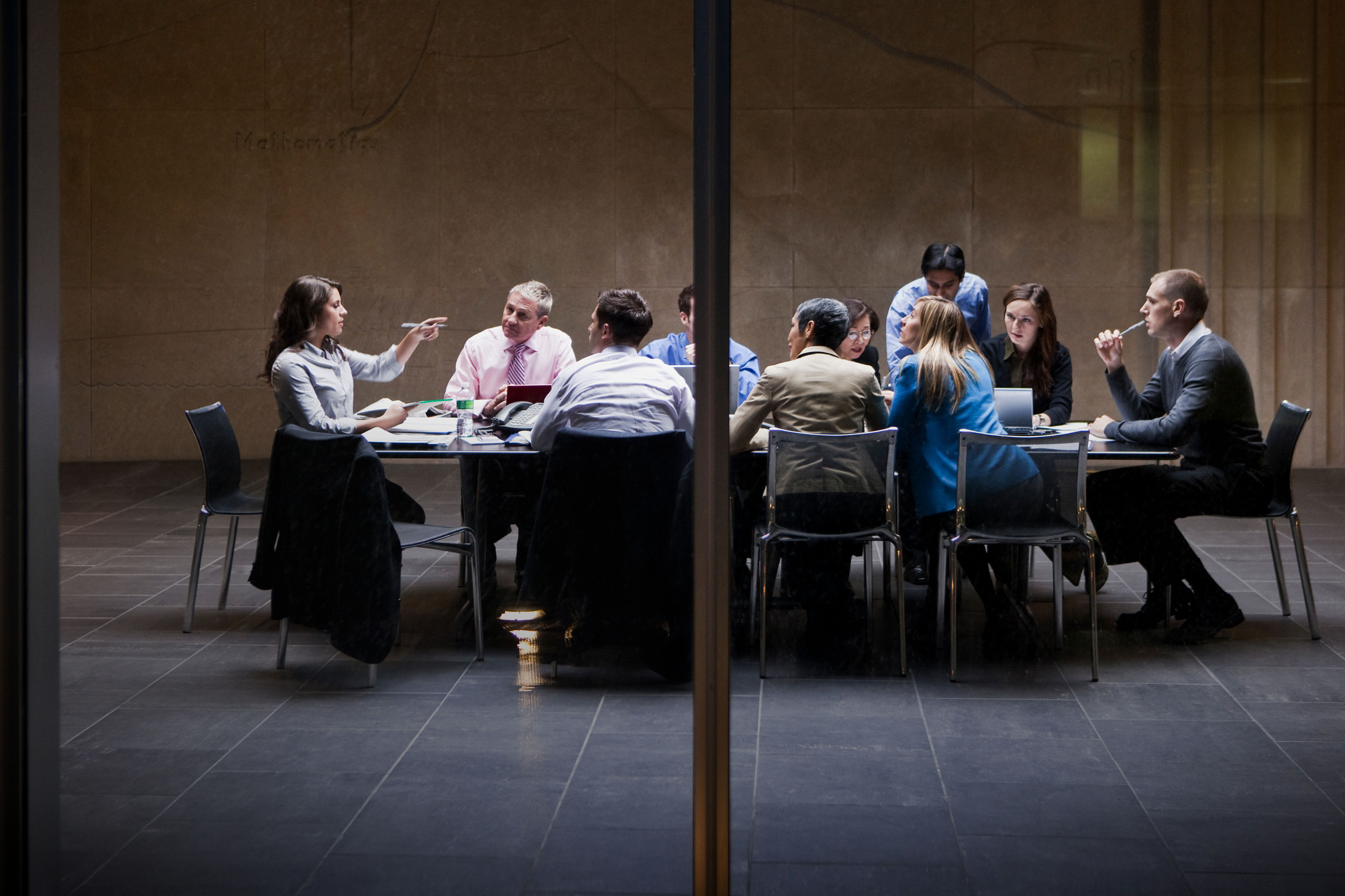 Business meeting around table