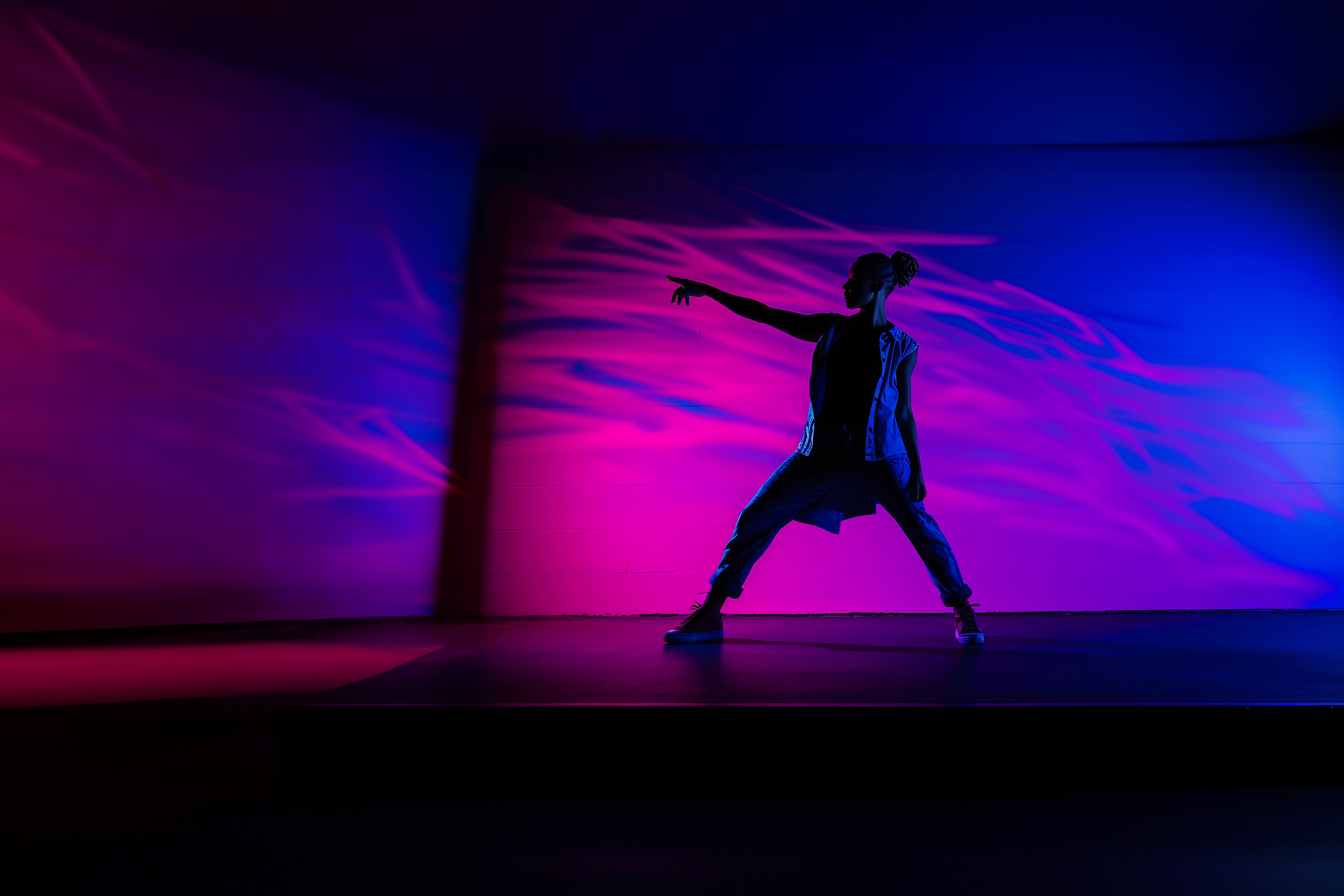 silhouette of a hip hop dancer in a dynamic pose