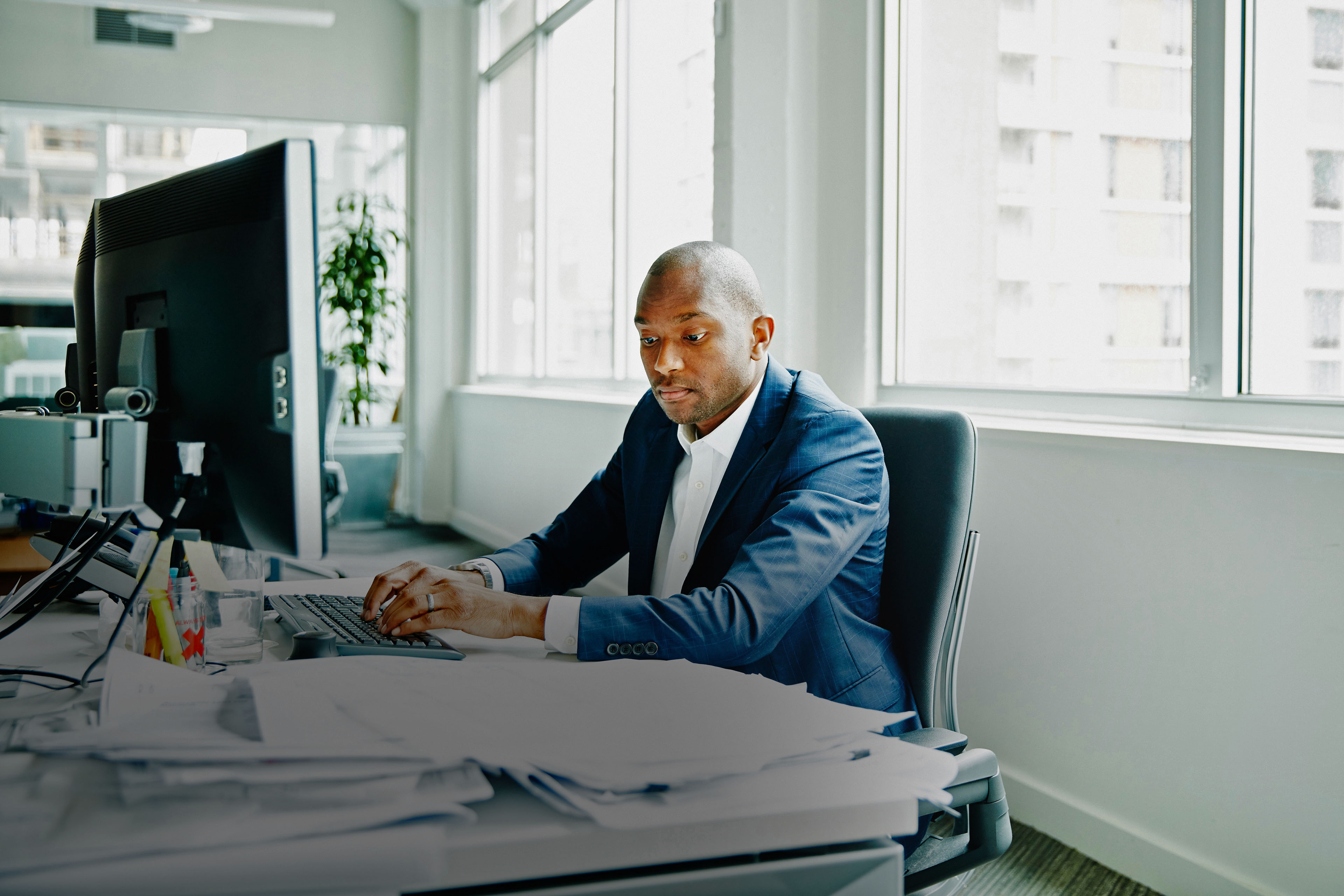 Businessman working on computer in office