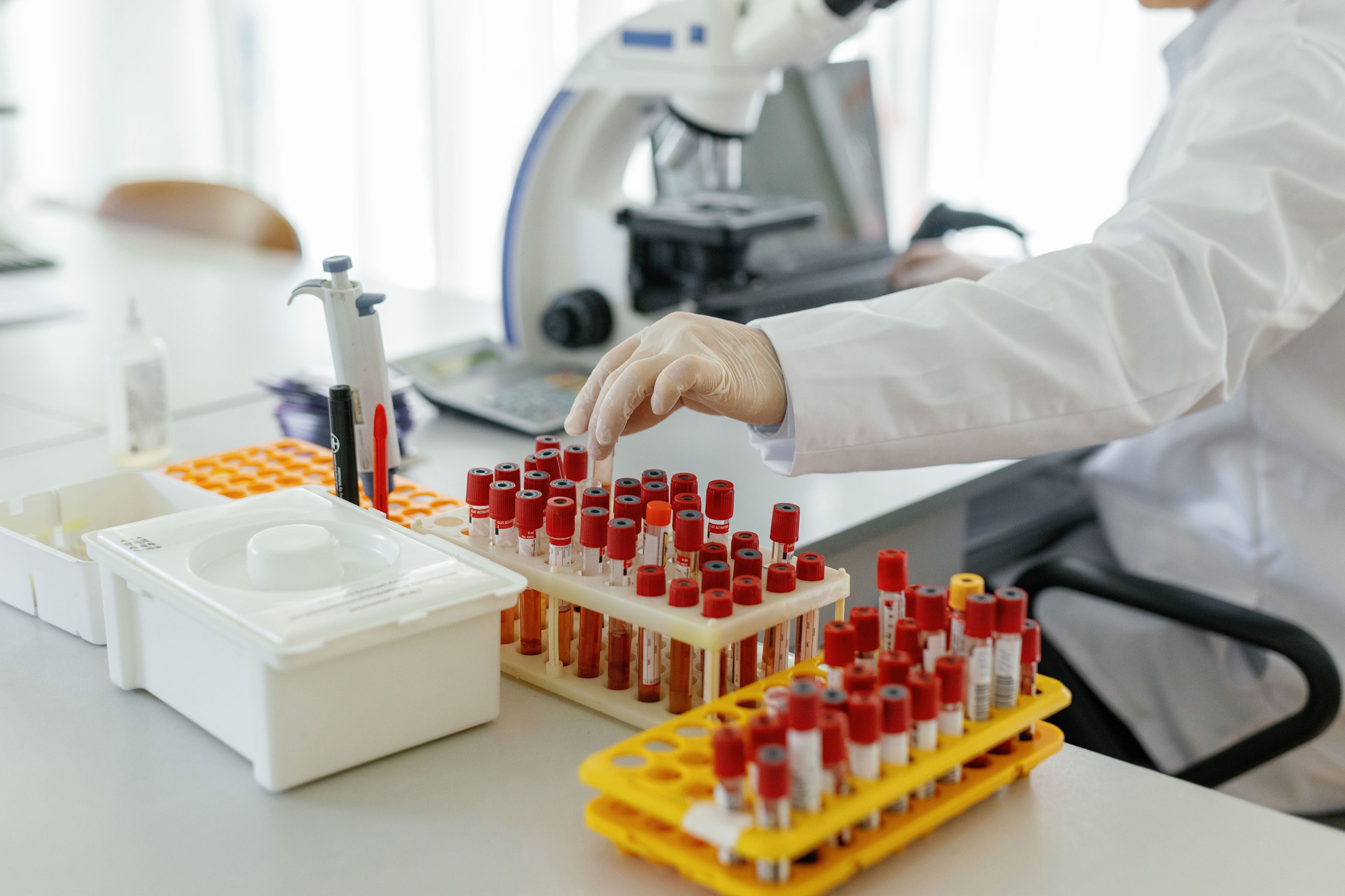 chemist analysing samples in a modern lab