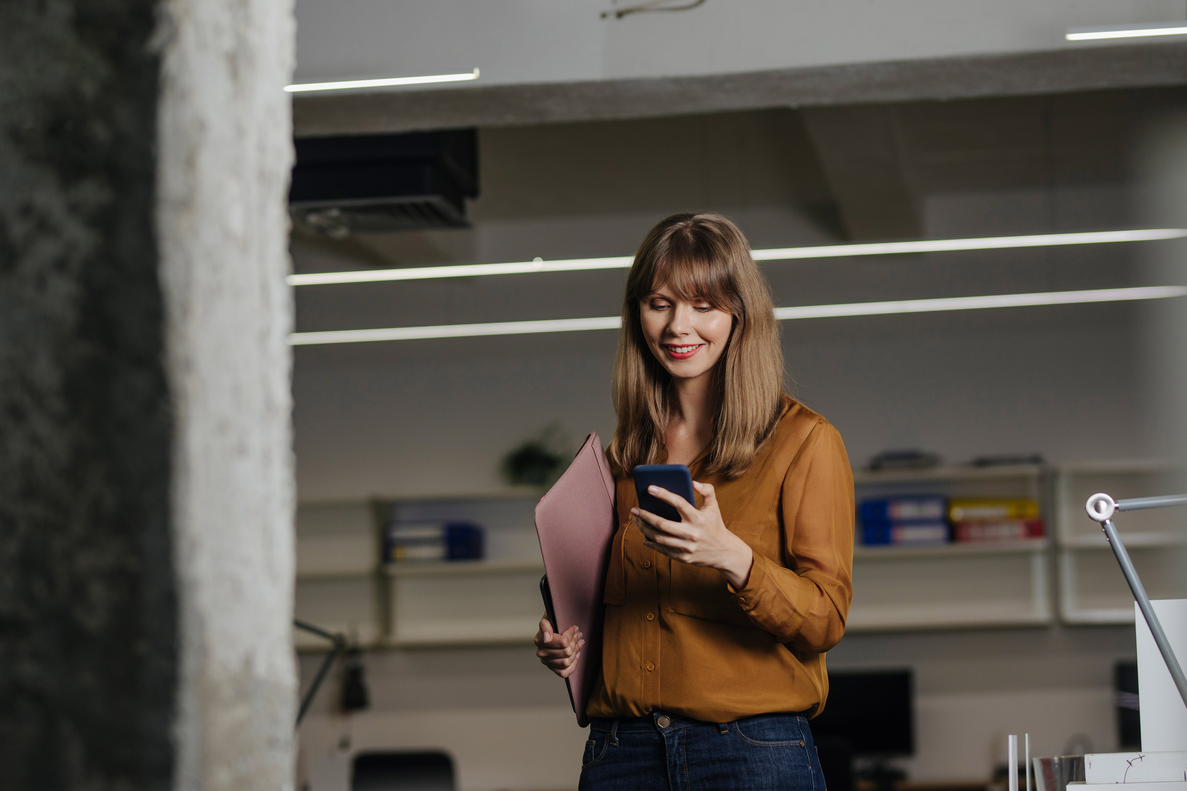 Businesswoman using her smartphone