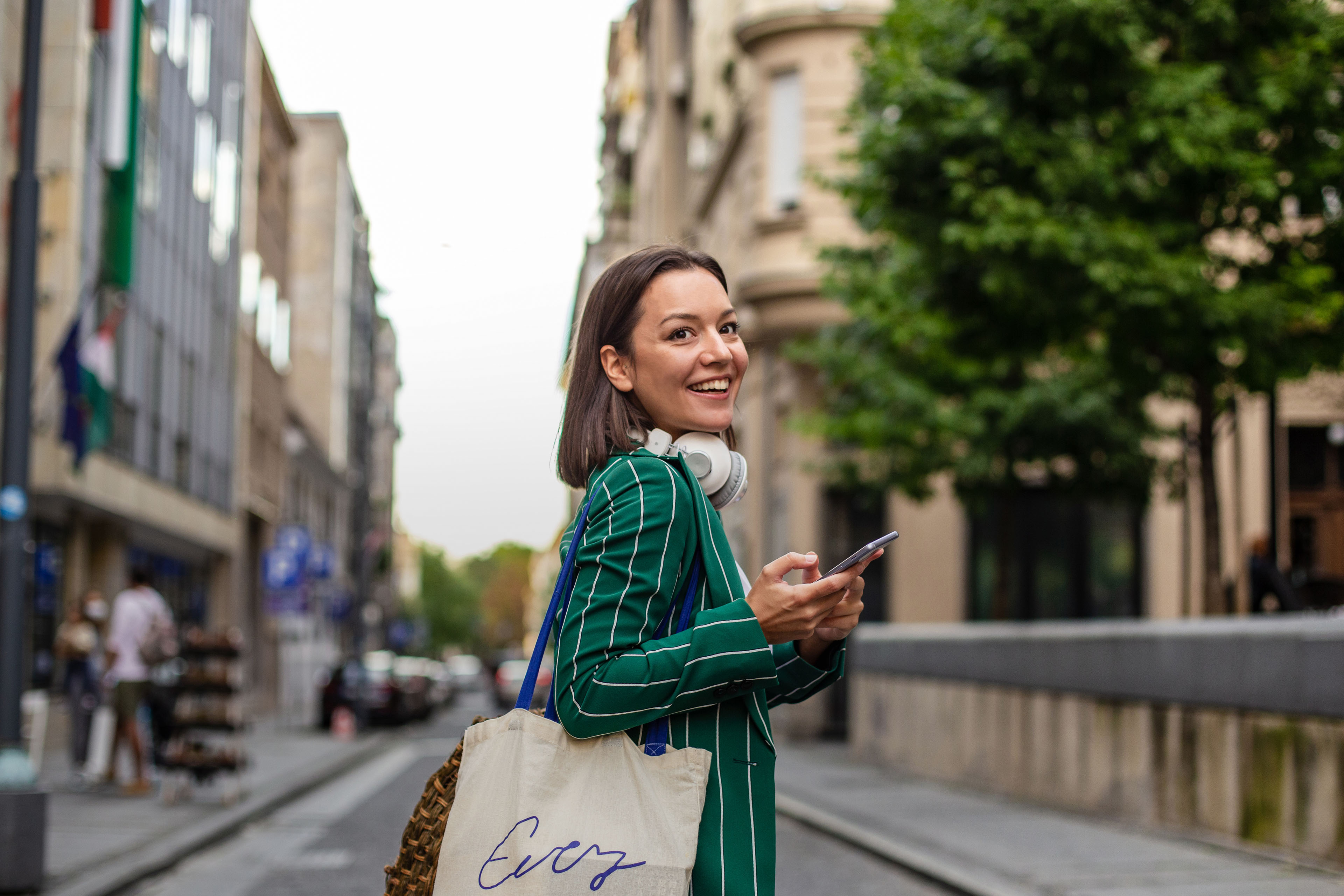 Modern woman walking on the street