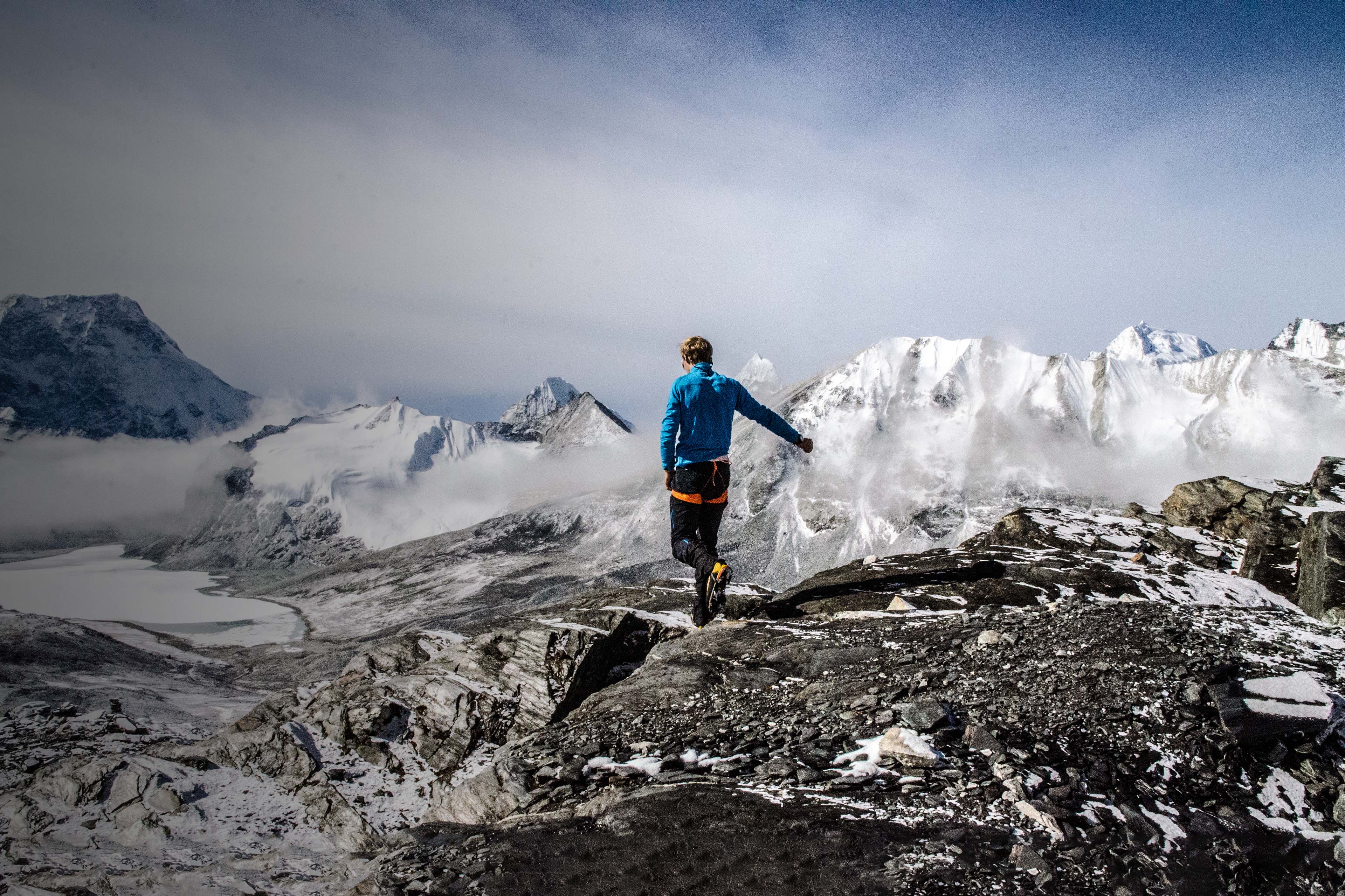 Woman standing on snow covered landscape