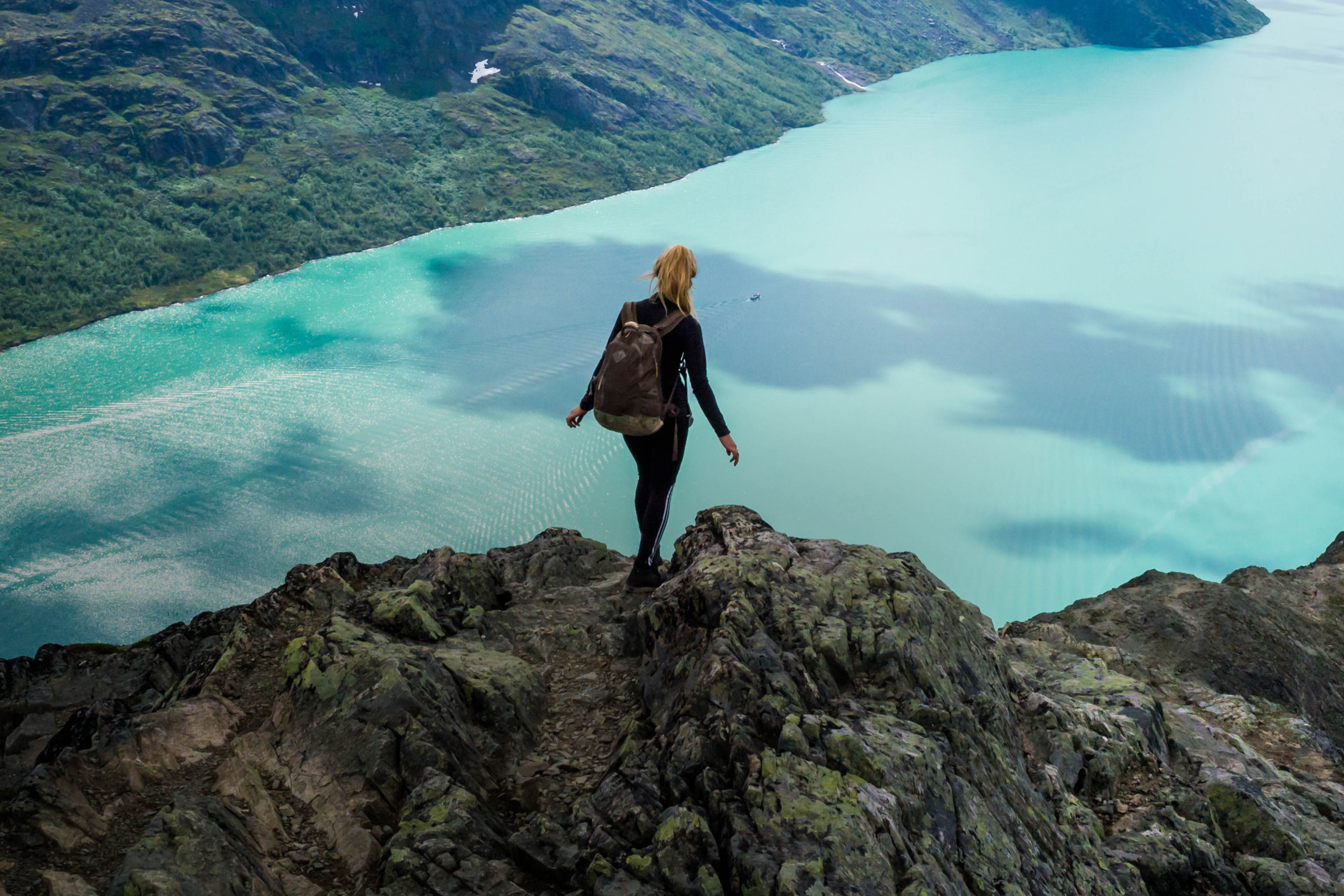 Young woman standing on rocks