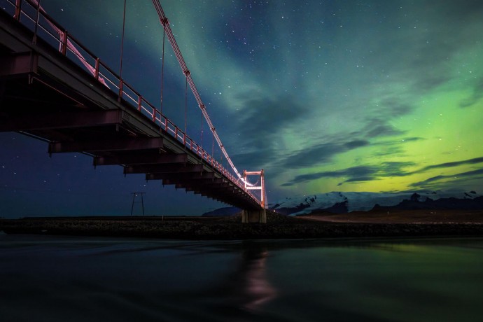 A picture of a bridge with a sky background