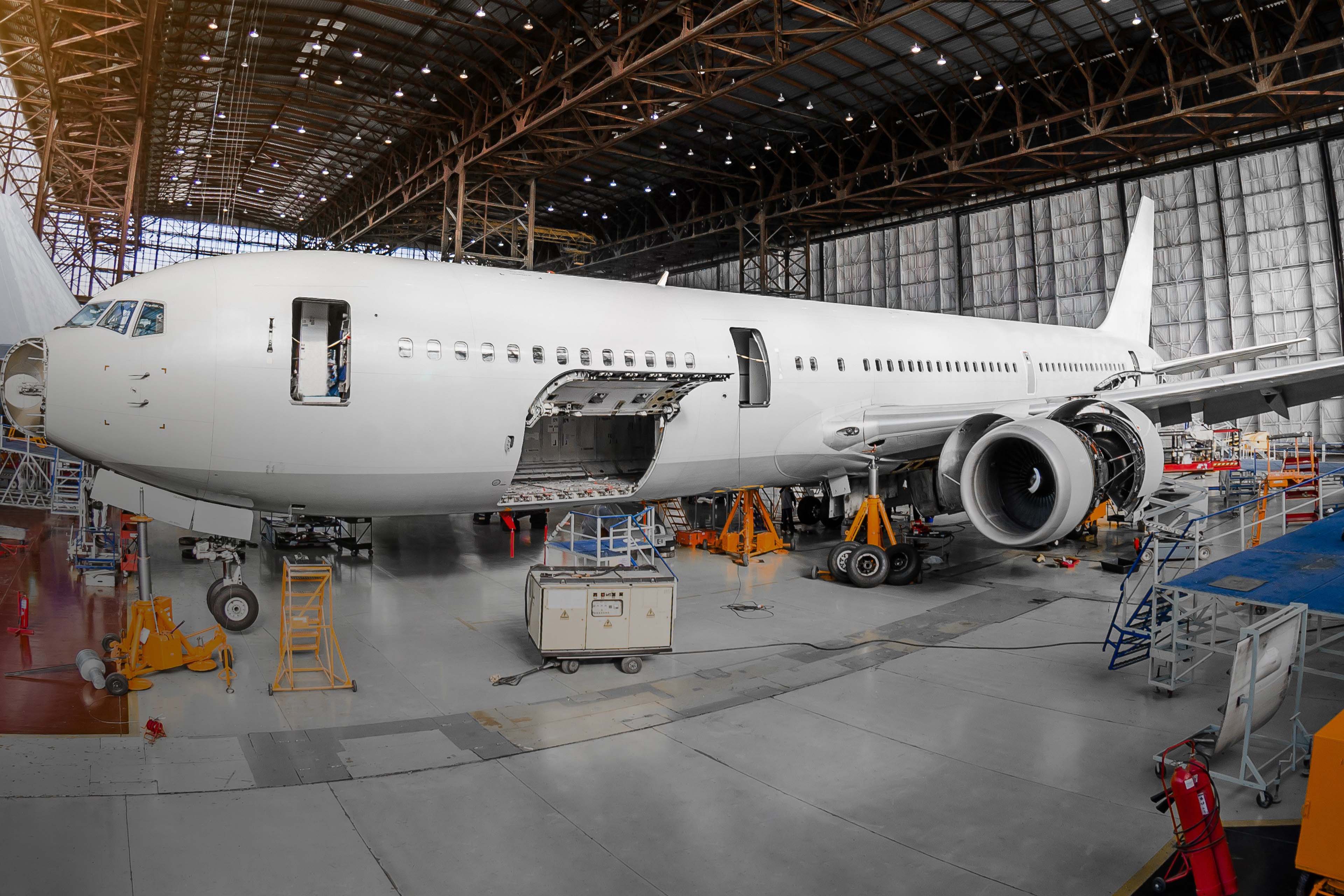 Passenger aircraft in a hangar