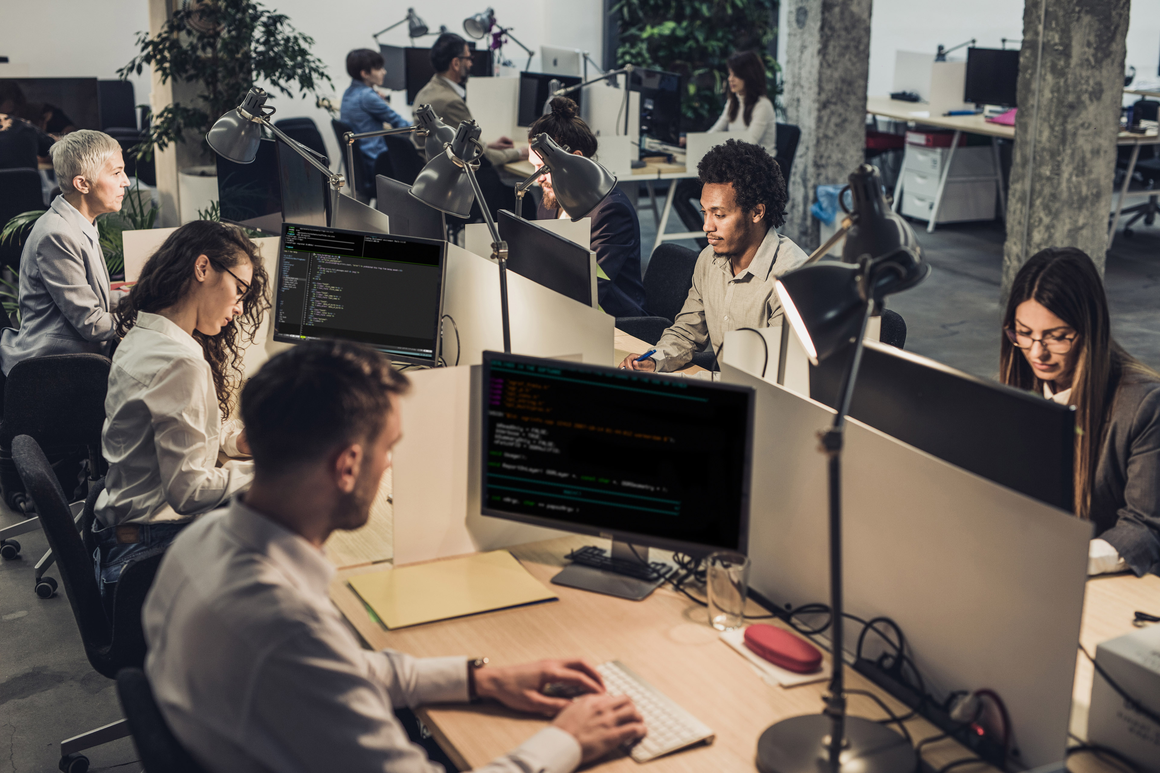  Group engineers working computers