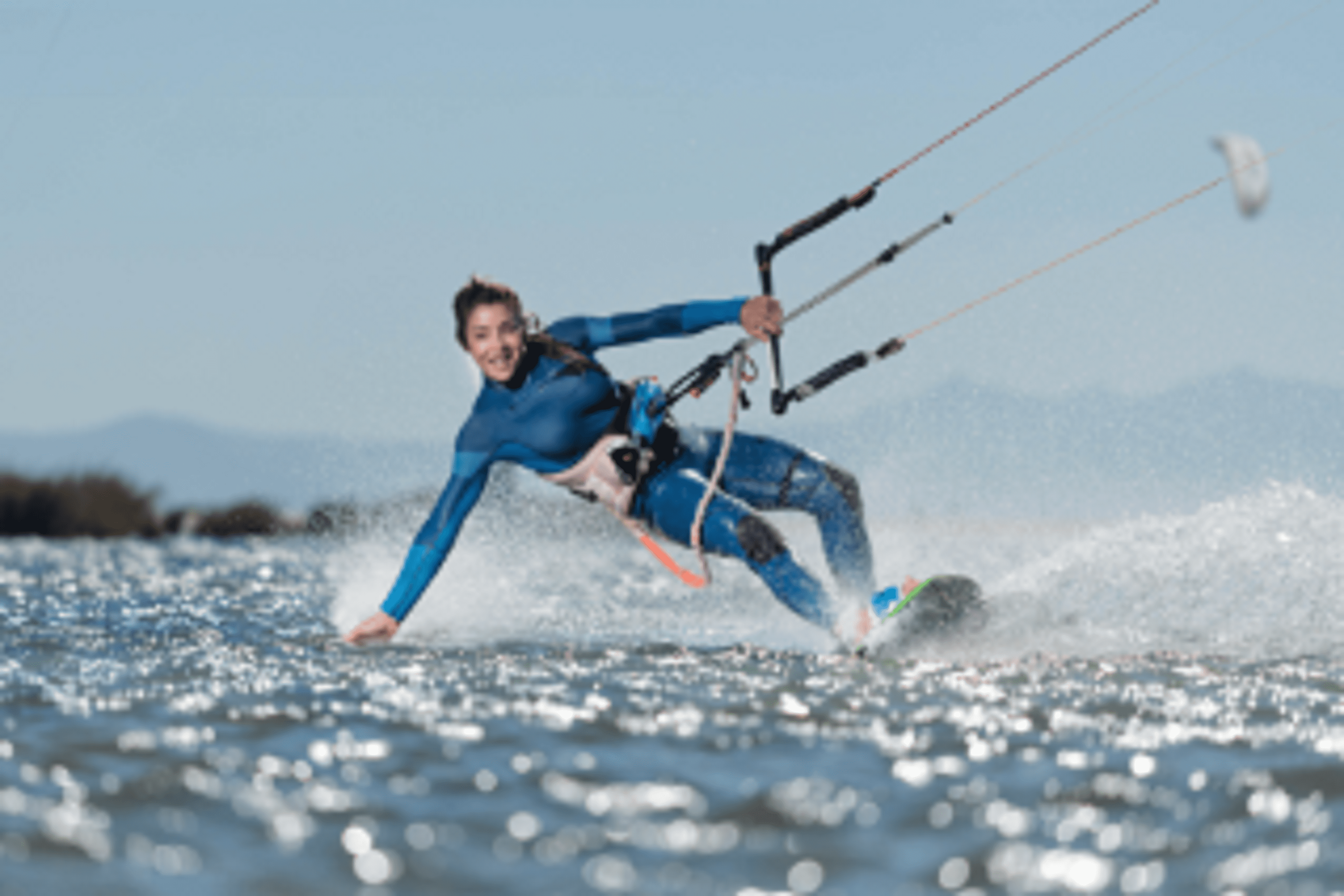 Female kite surfer, costa de la Luz, Andalusia, Spain