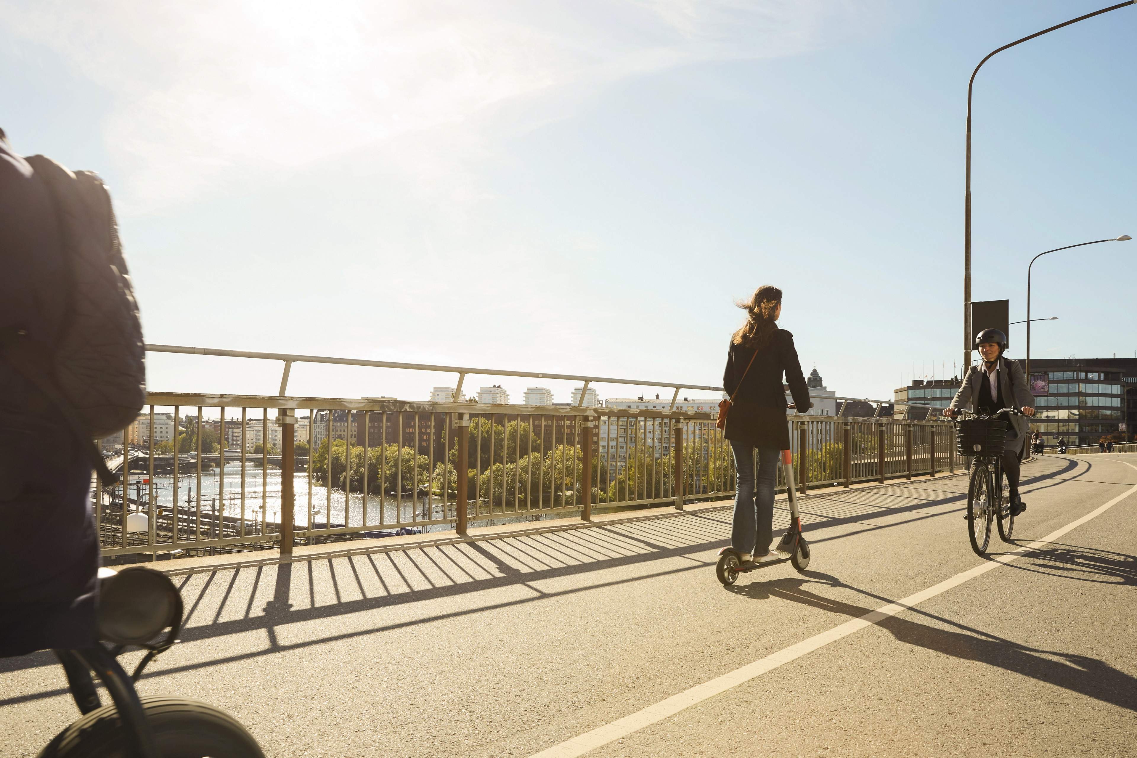 Riding electric vehicles on bridge