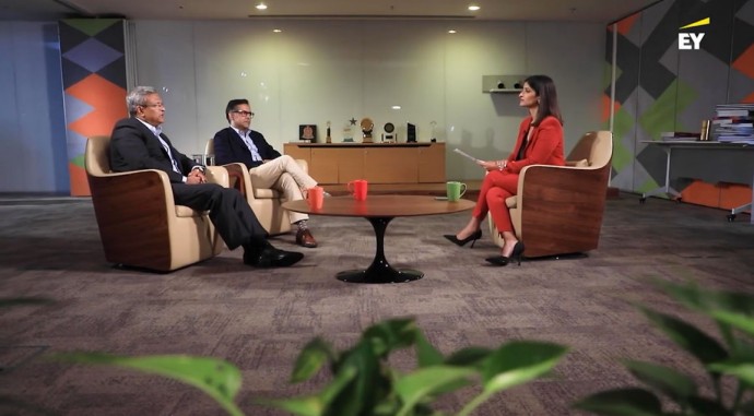 Three people in an interview setting