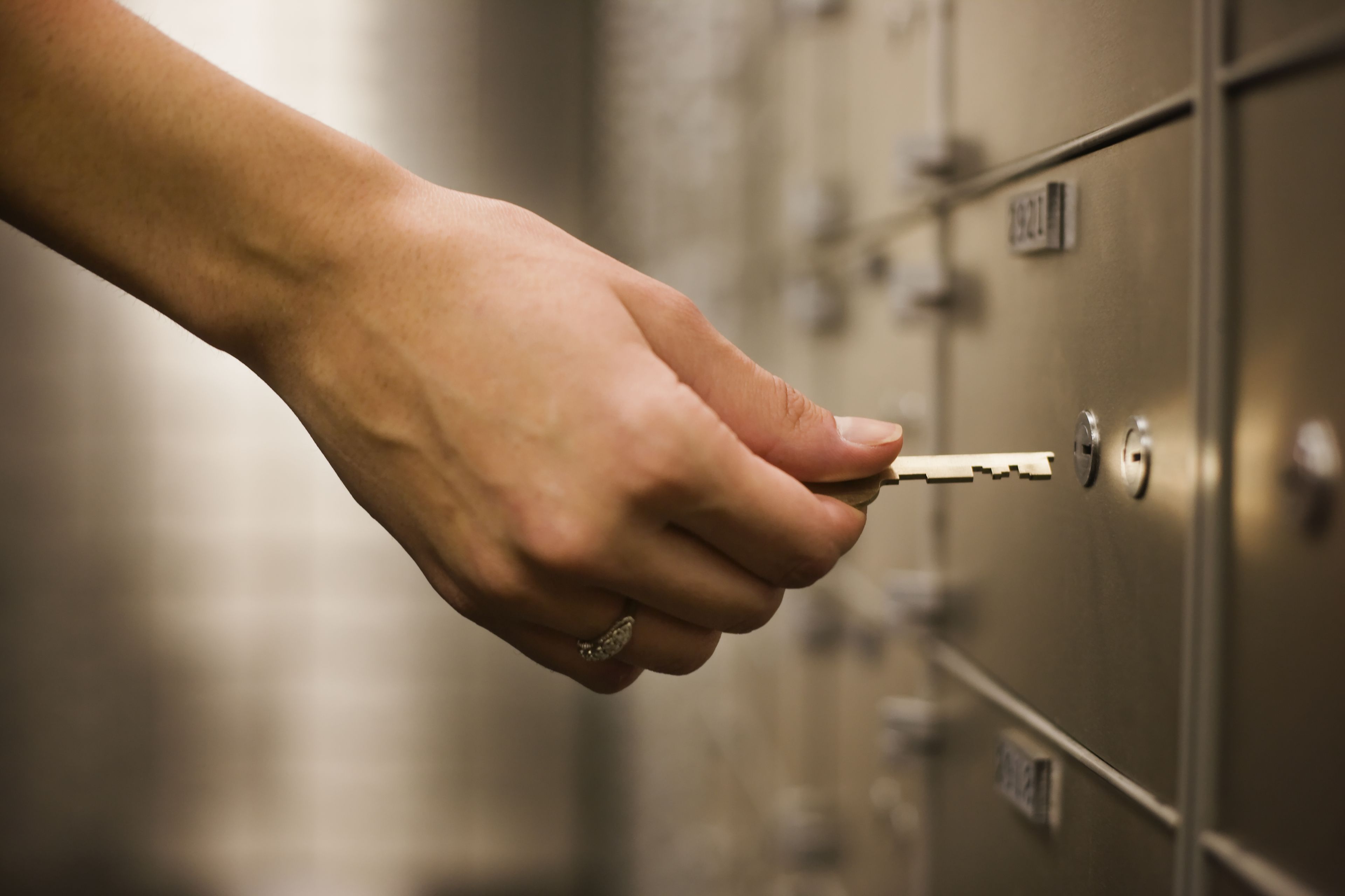 Someone is opening the locker with key