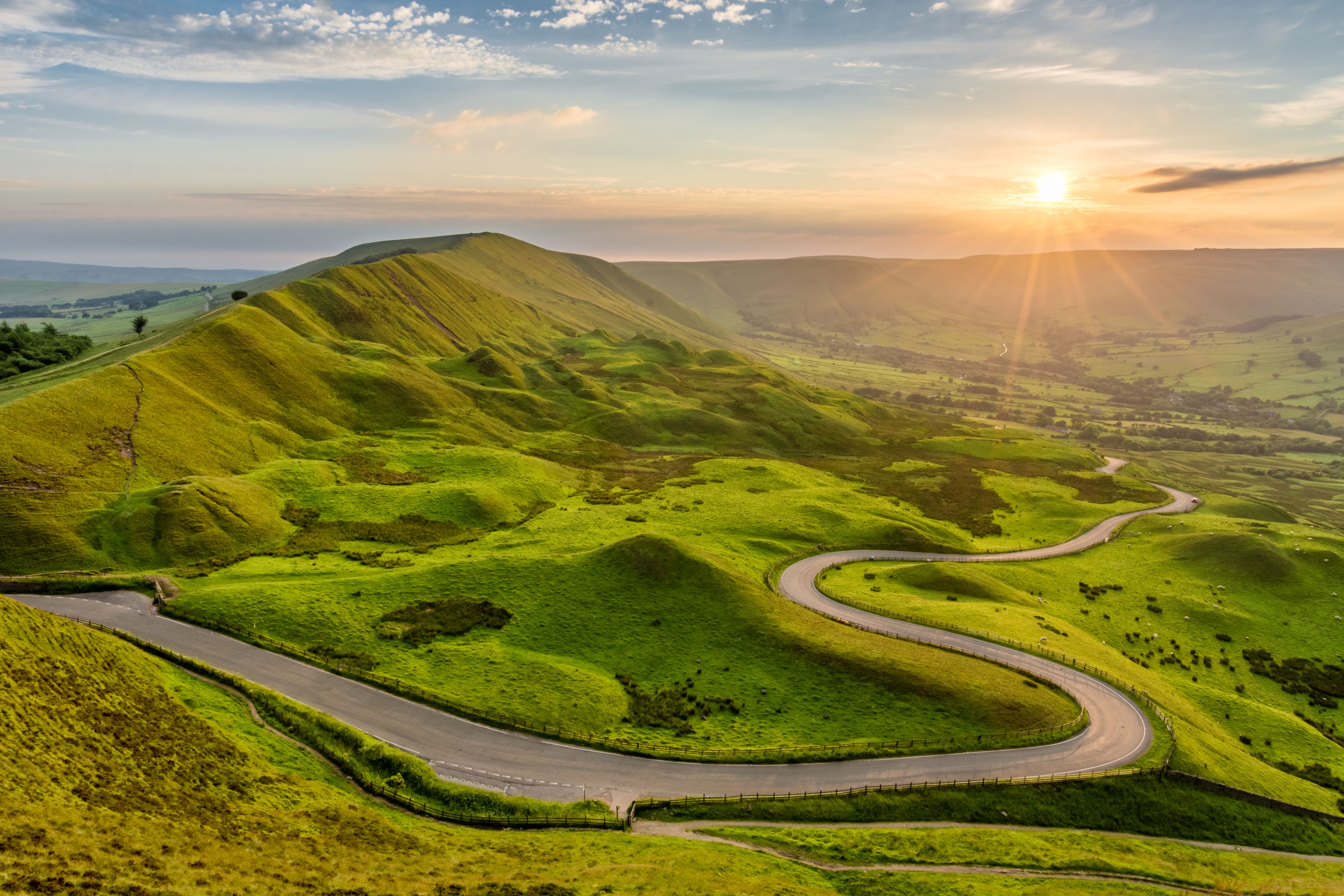 View of Sunrise and road way between hills