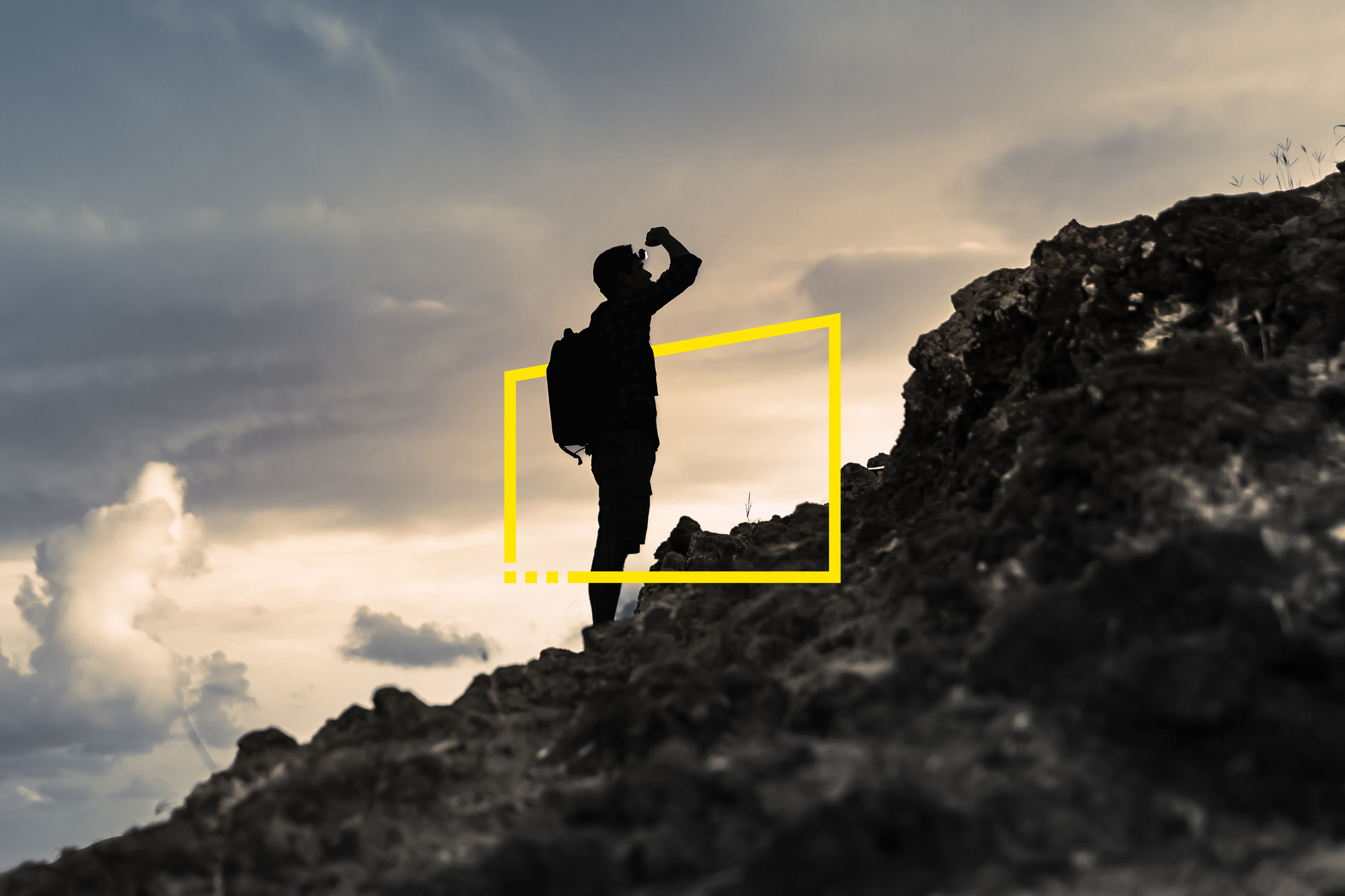  Man getting ready to climb up mountain