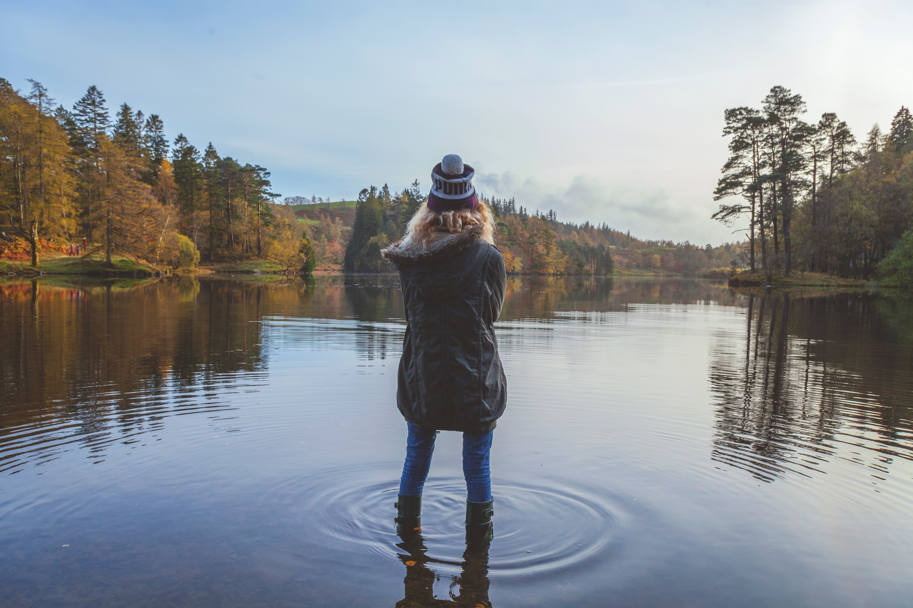 EY Women standing at lake