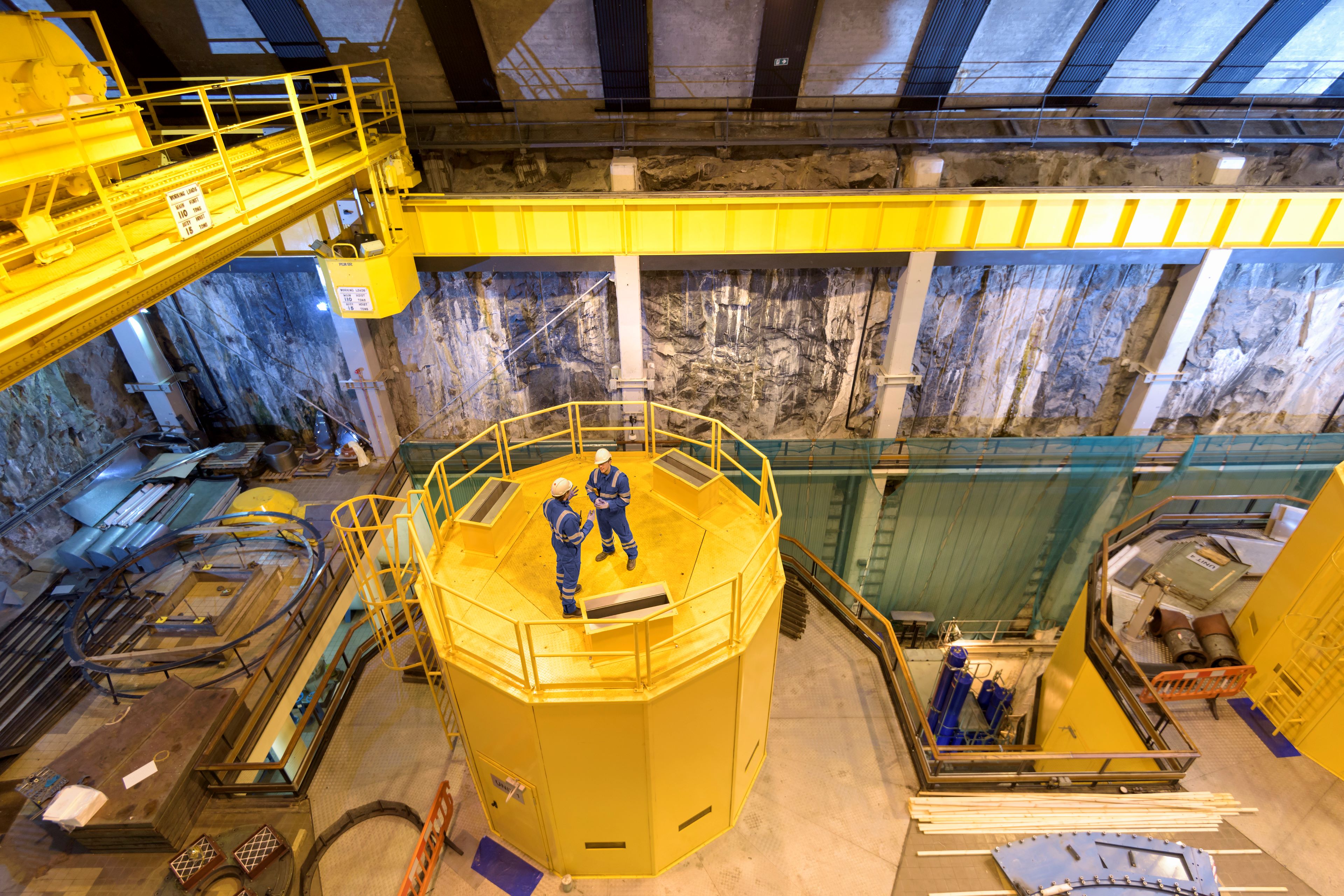 Workers in an hydroelectric power station