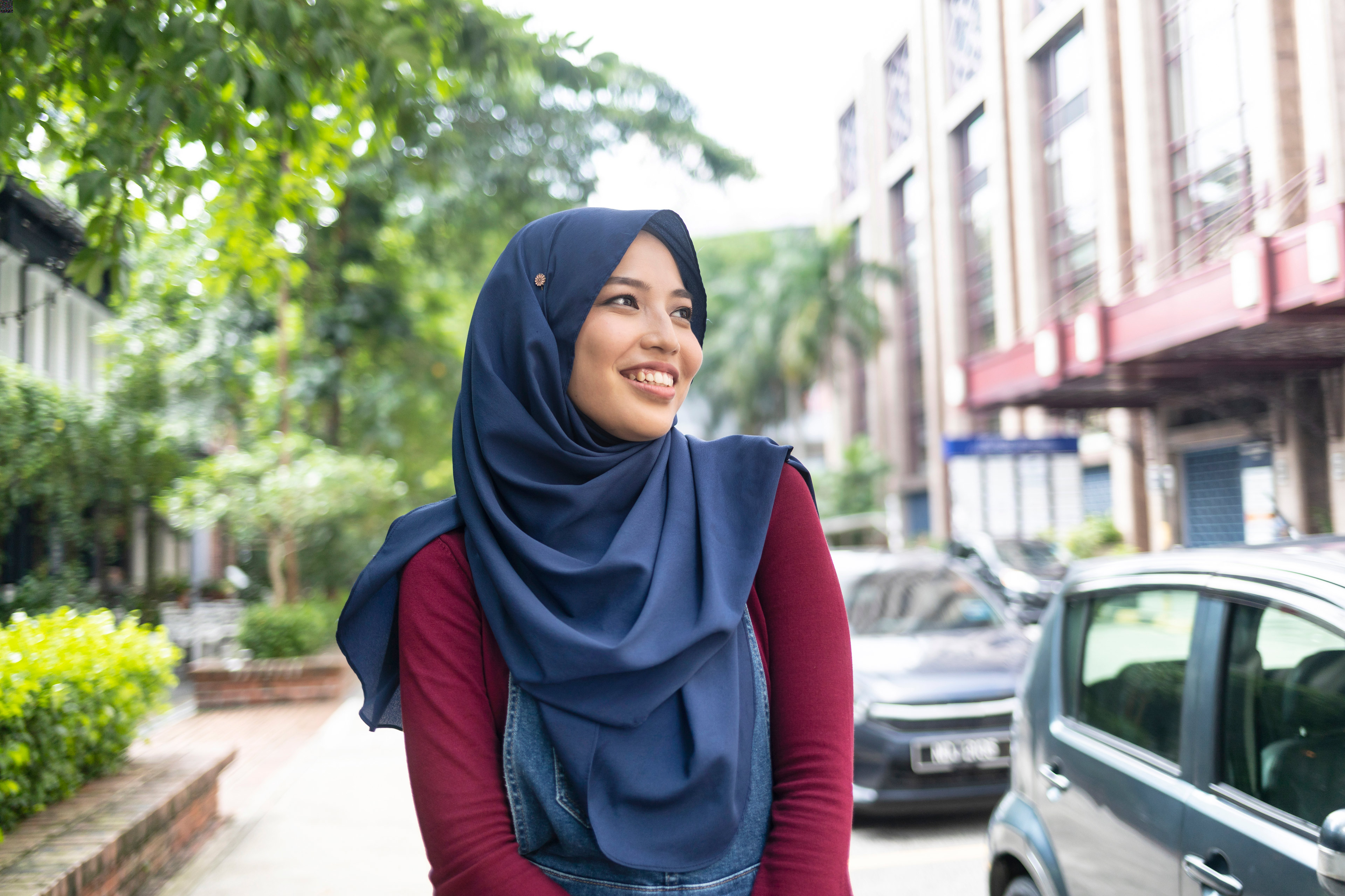 Smiling tourist in the city walking on street