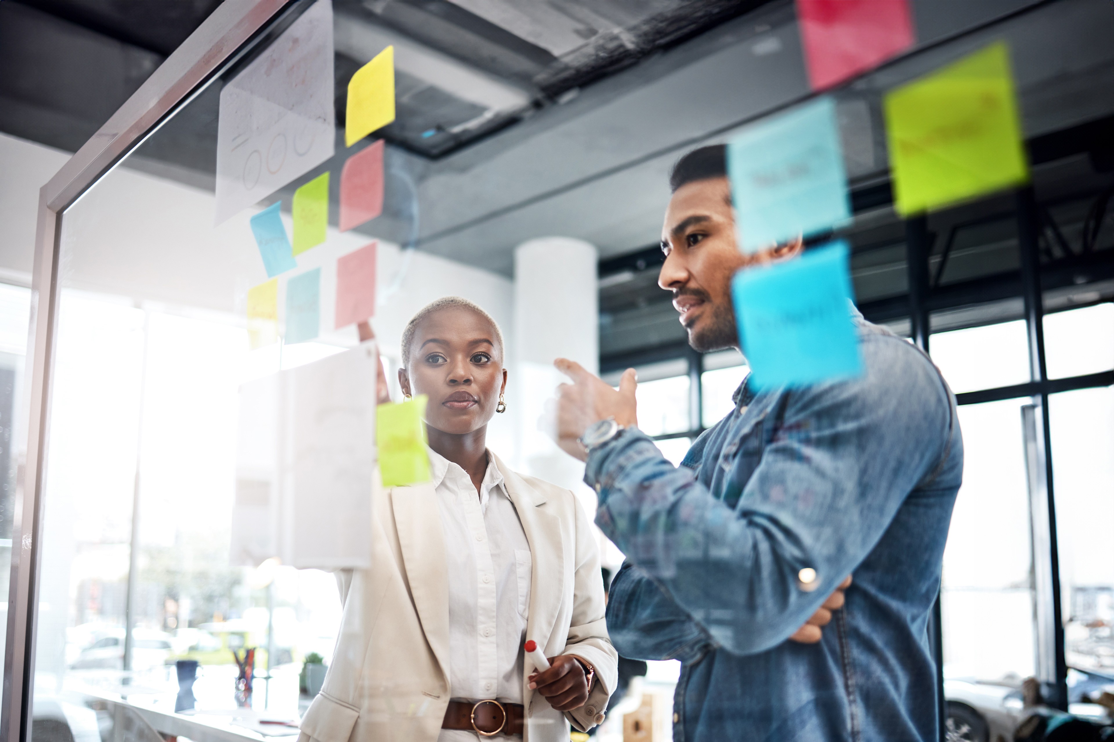 Man and woman in teamwork planning brainstorming