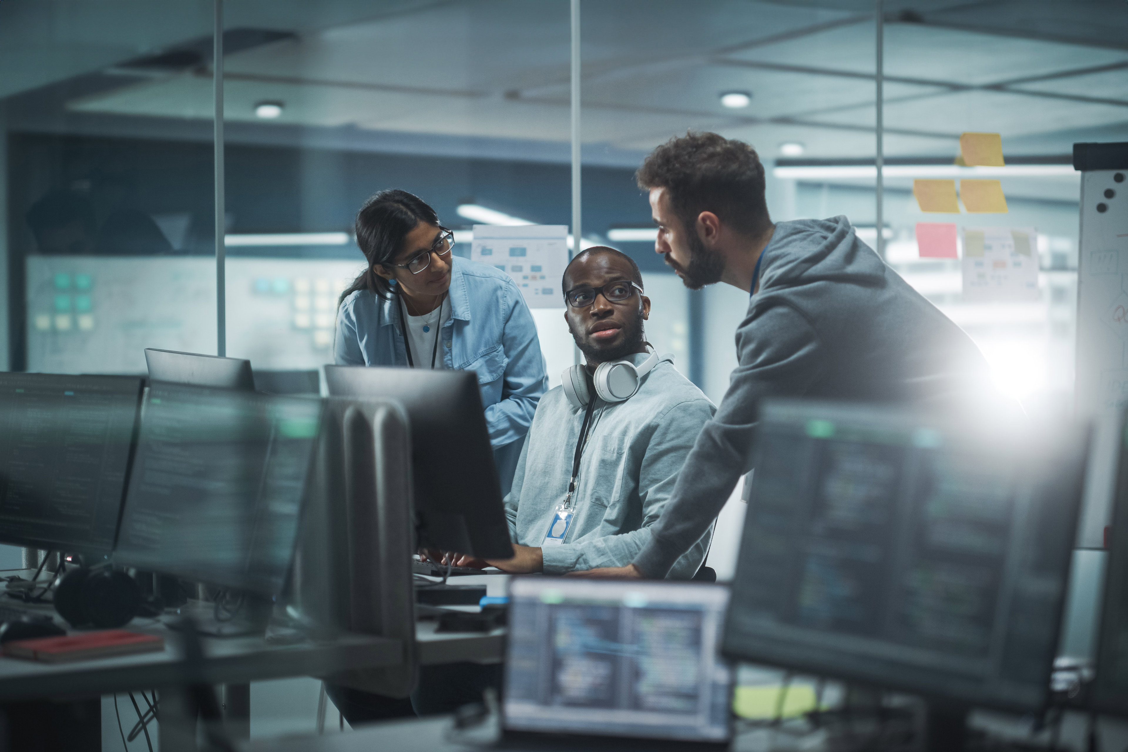 Diverse Group of Professionals Meeting in Modern Office