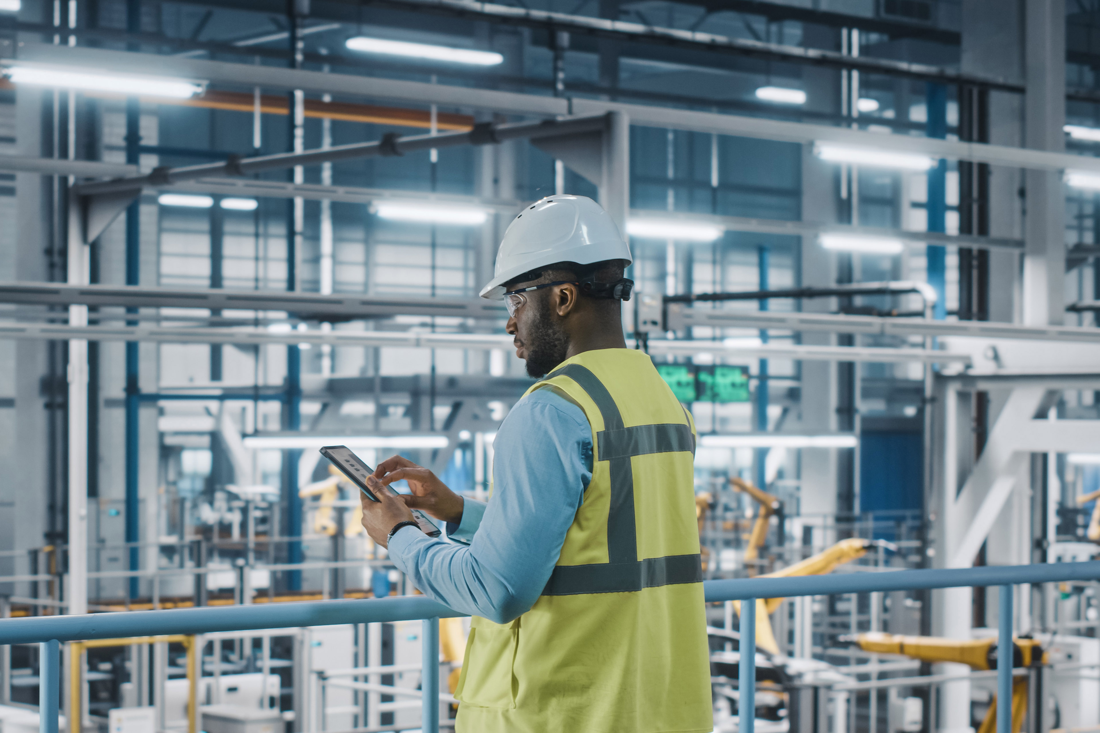 African American Car Factory Engineer in High Visibility ...