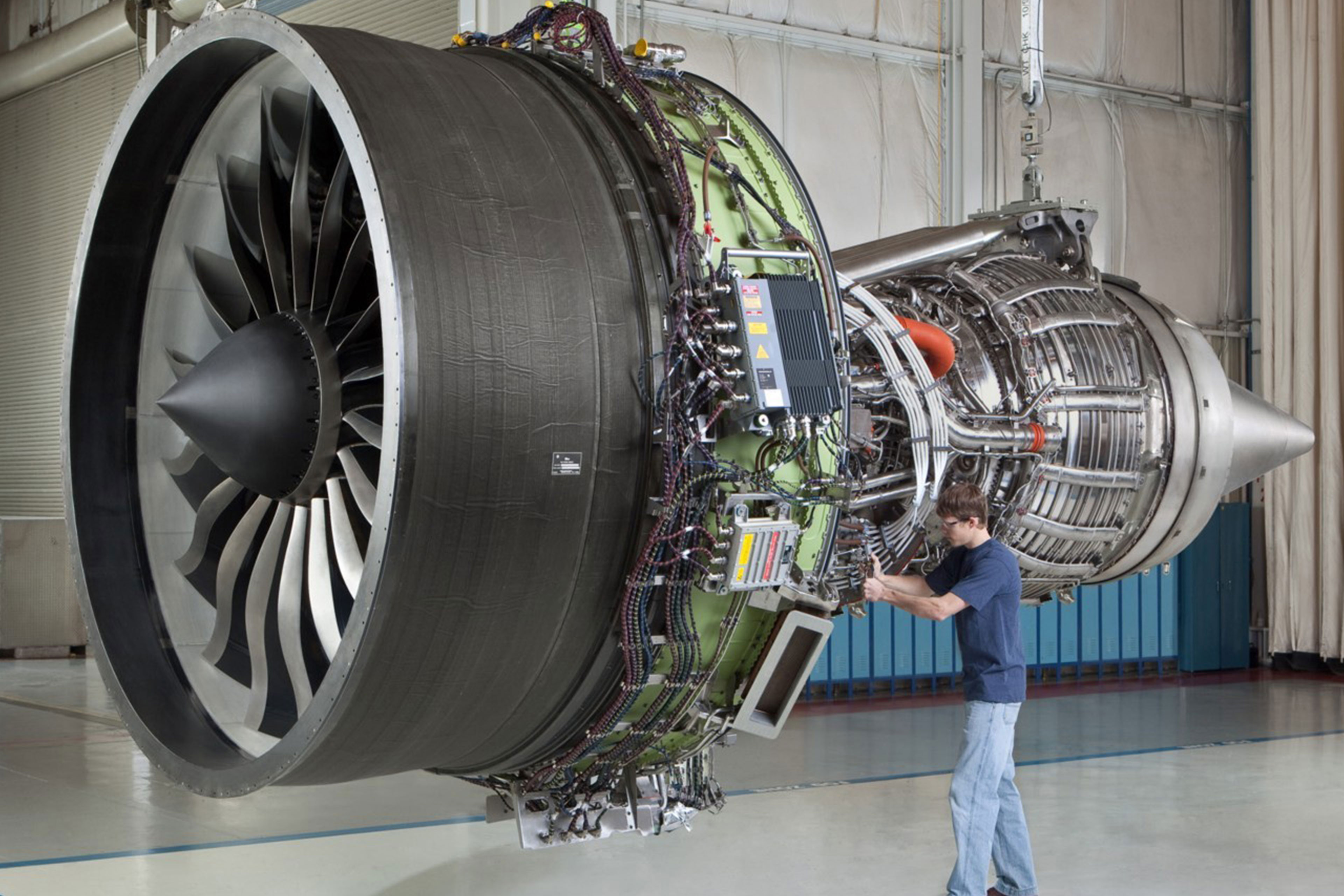 Mechanic working on jet engine