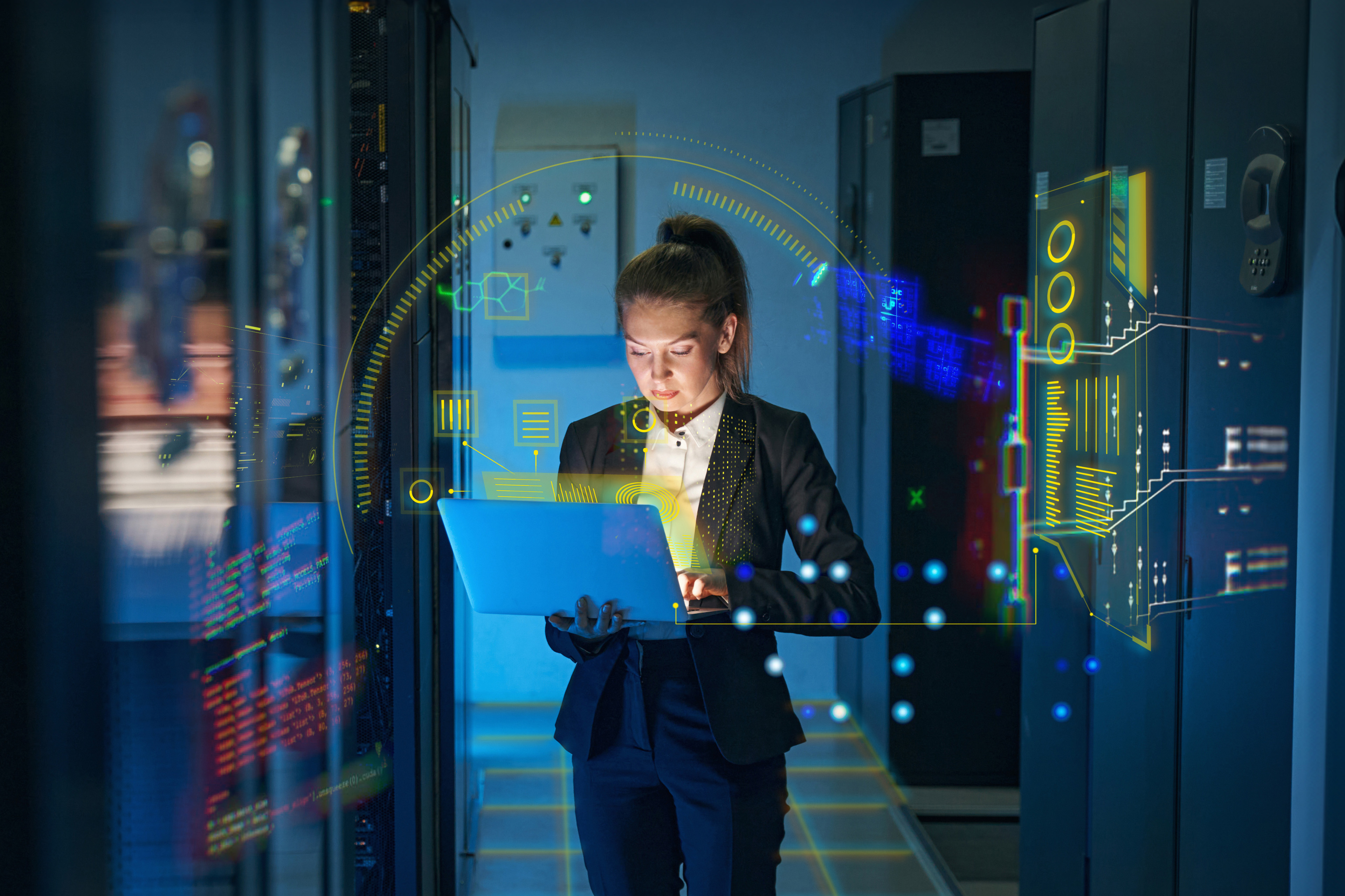 EY female technician laptop