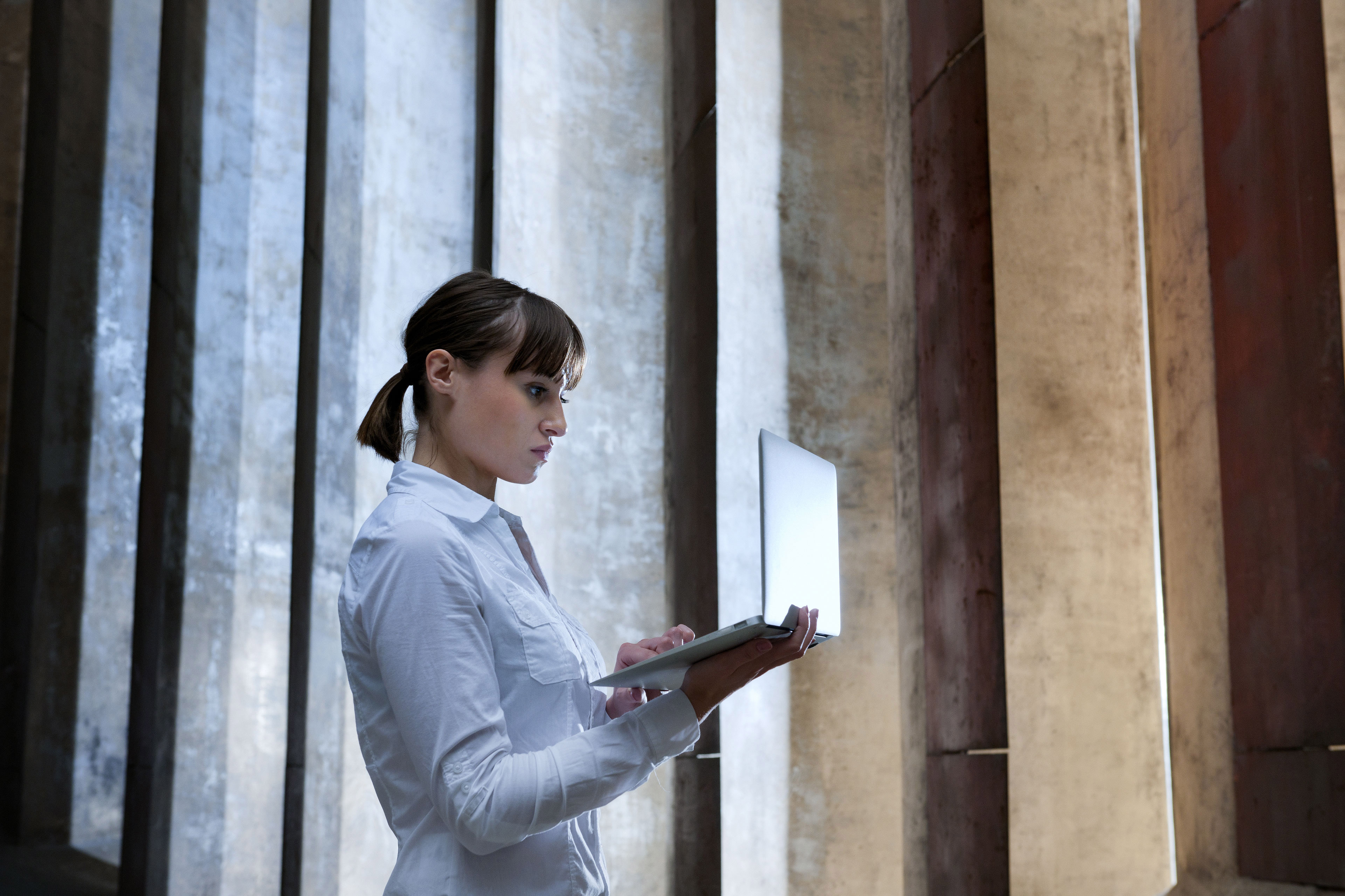 Businesswoman working on laptop