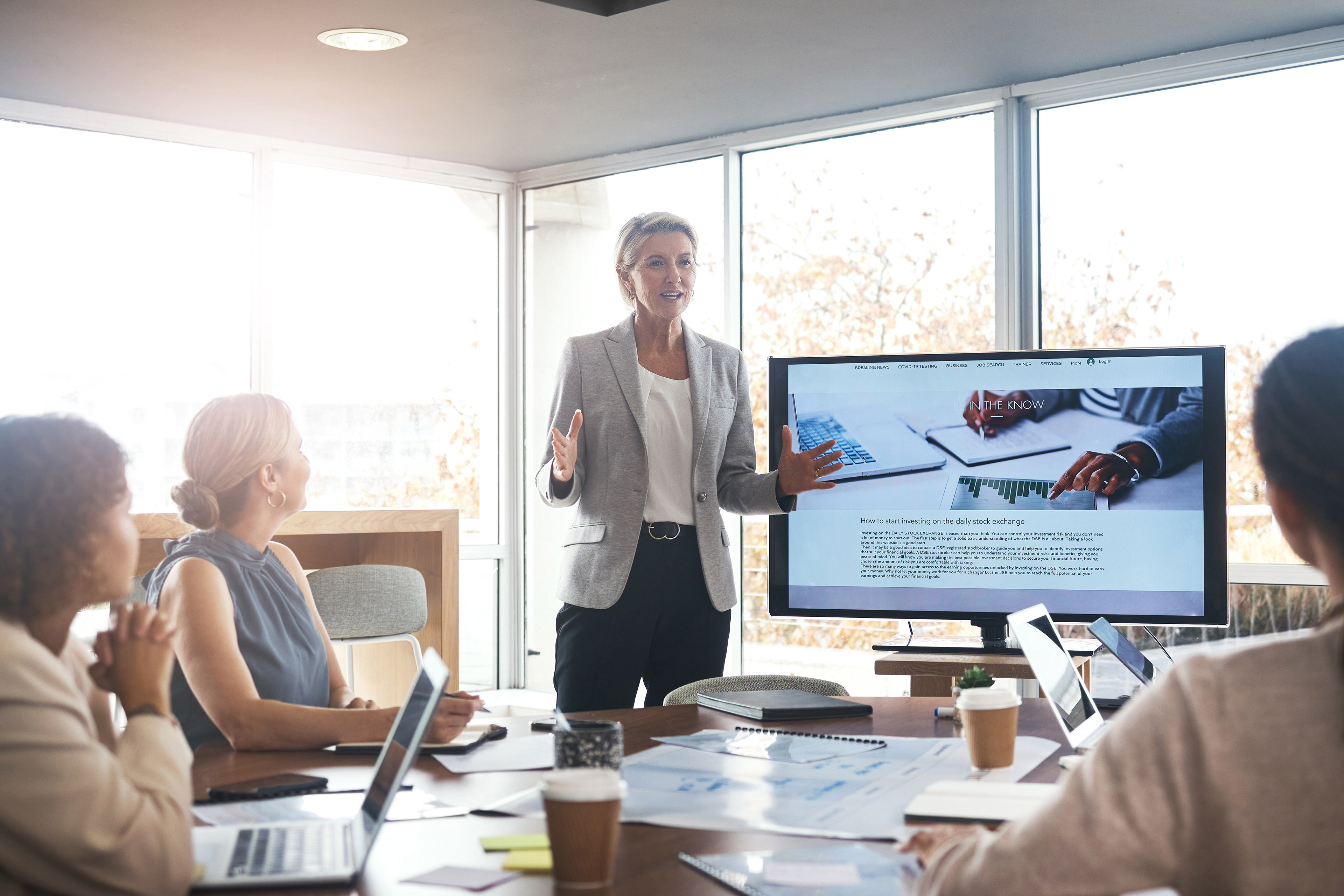 Female manager meeting with marketing group