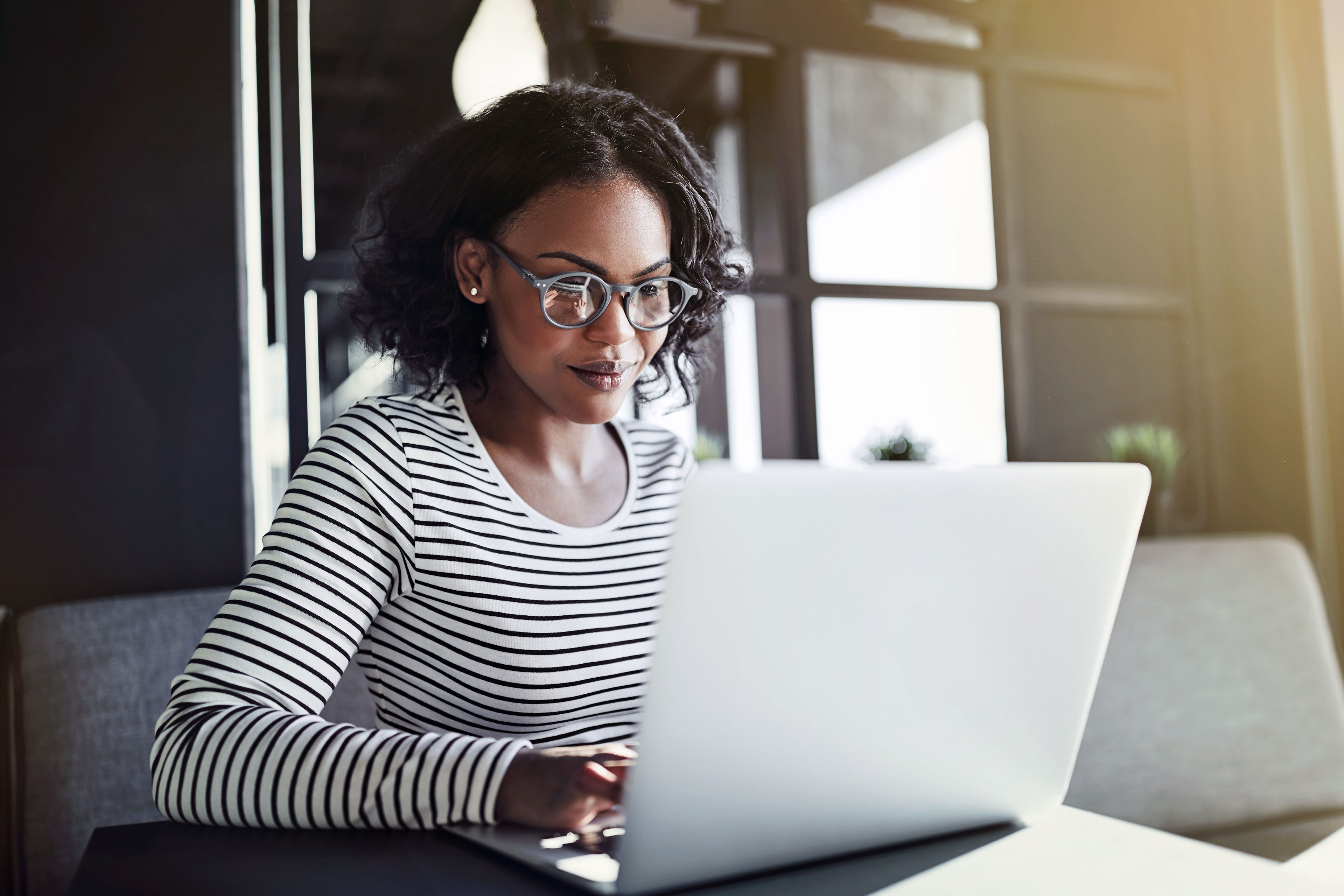 Young woman working on laptop